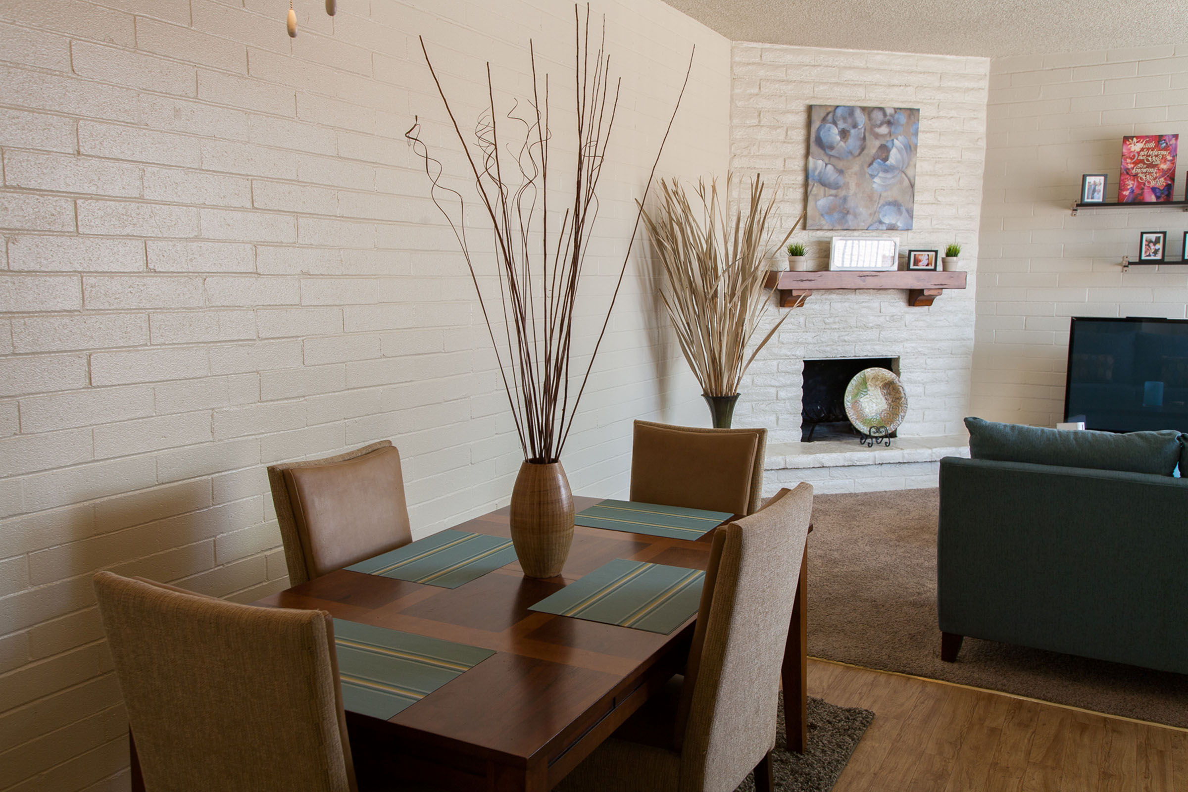 a living room filled with furniture and a table