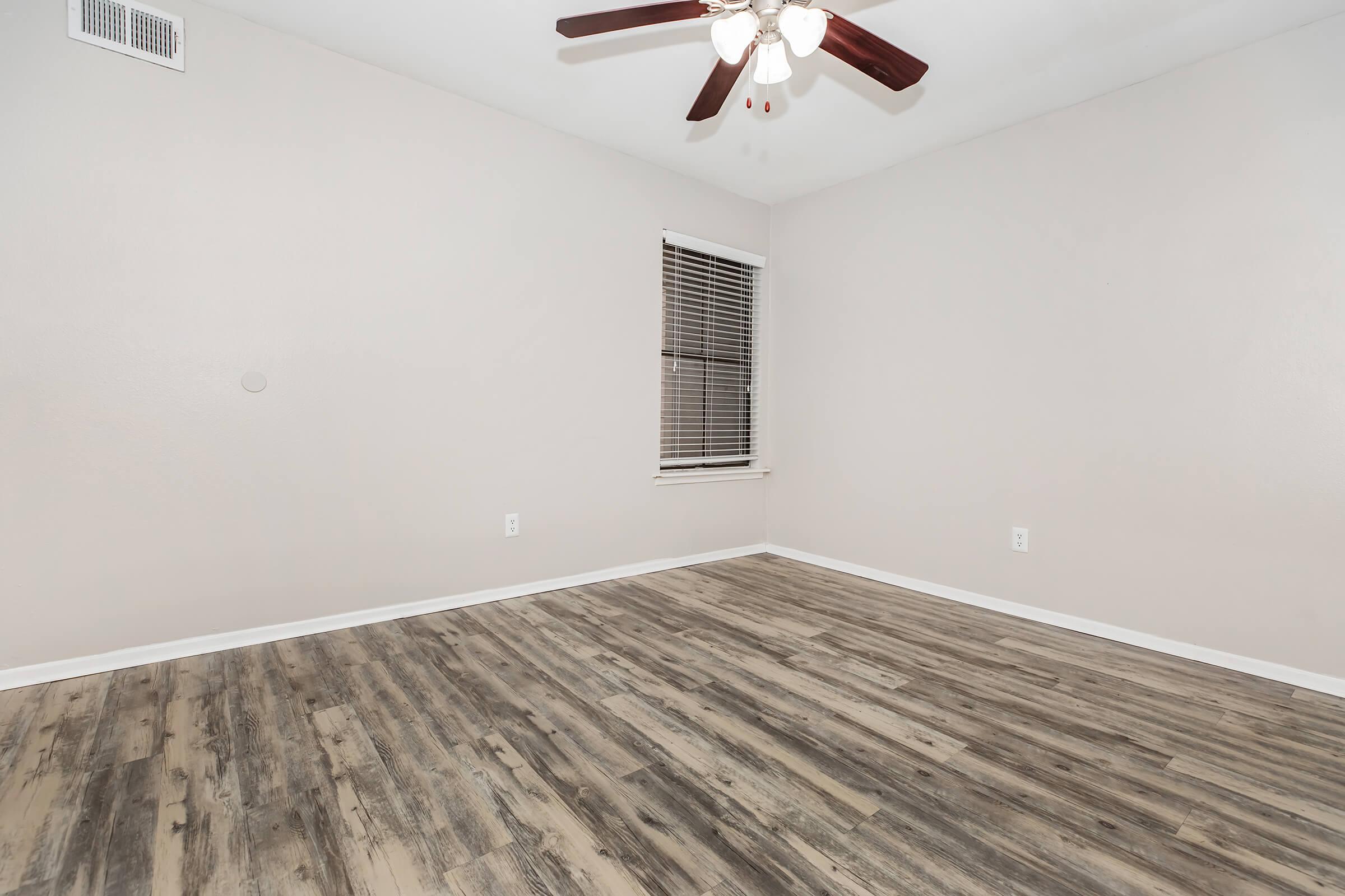 COMFORTABLE BEDROOM AT THE BRAZOS APARTMENTS