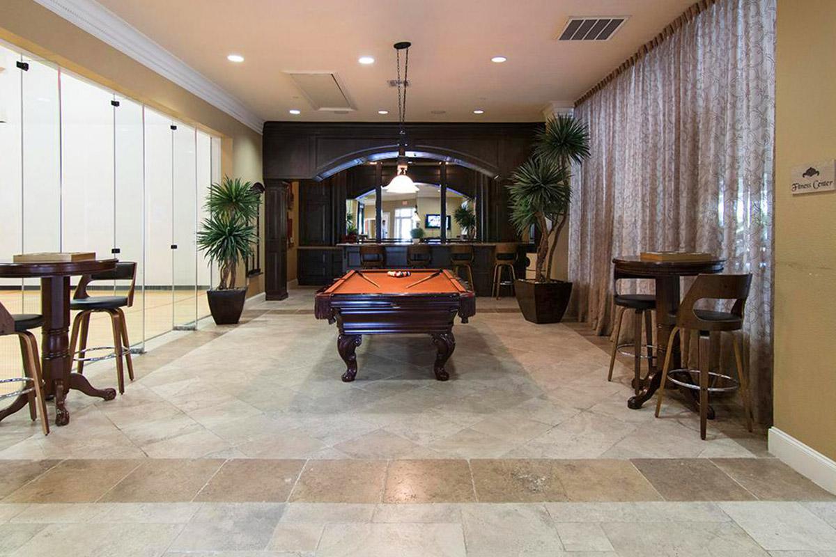 a living room filled with furniture and a fireplace