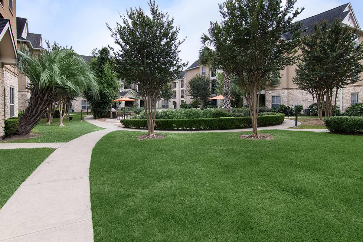 a large lawn in front of a house