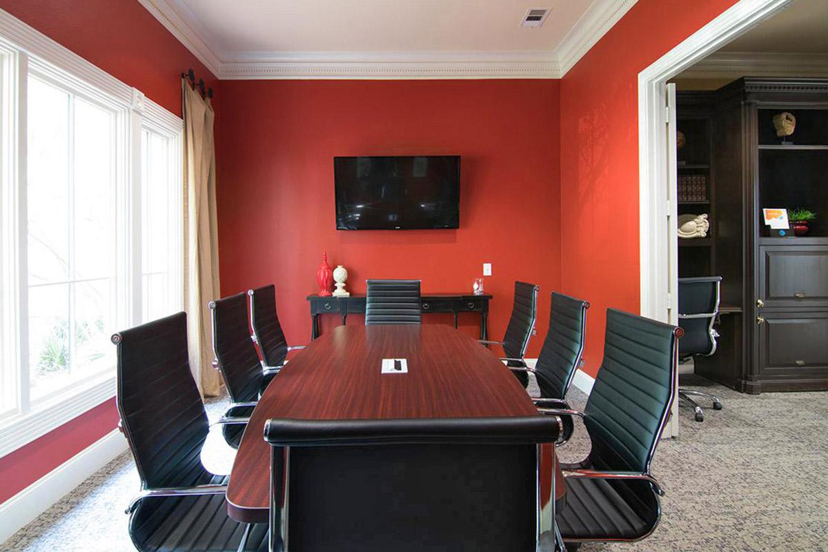 a large red chair in a room