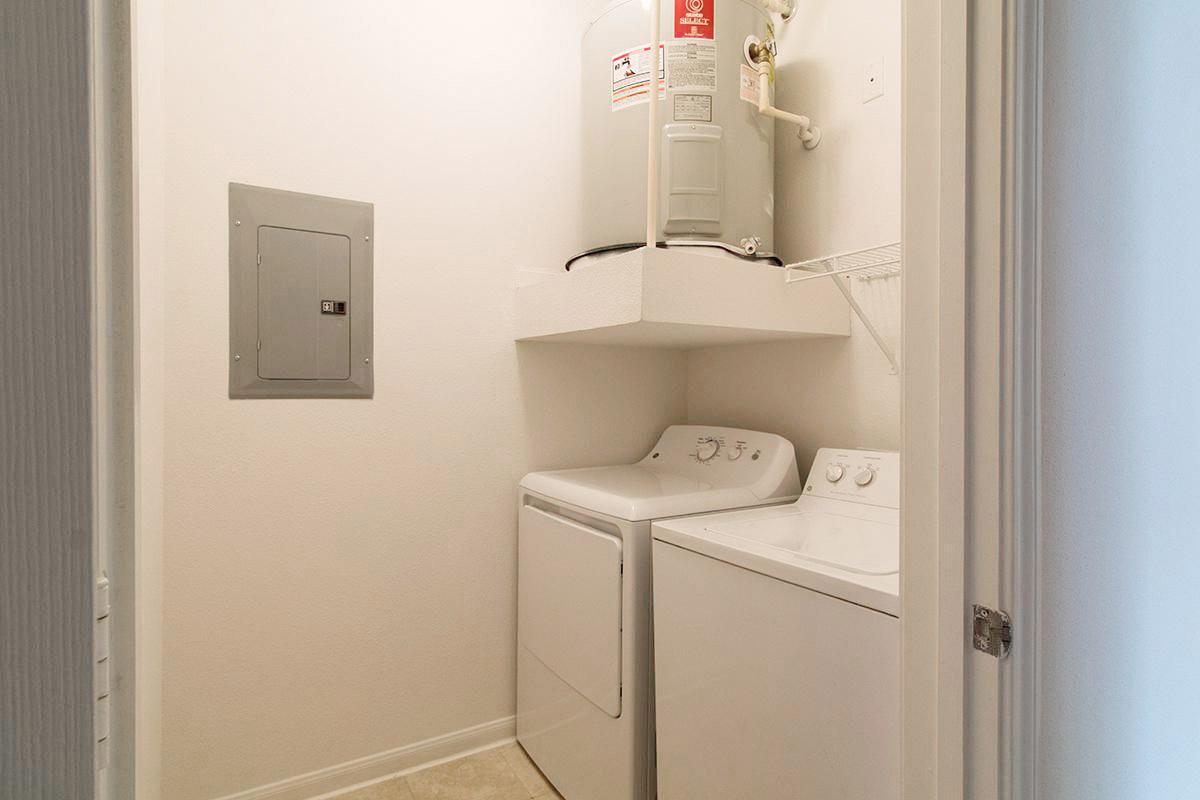 a white sink sitting next to a door