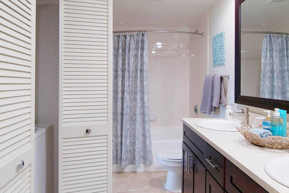 a kitchen with a sink and a window