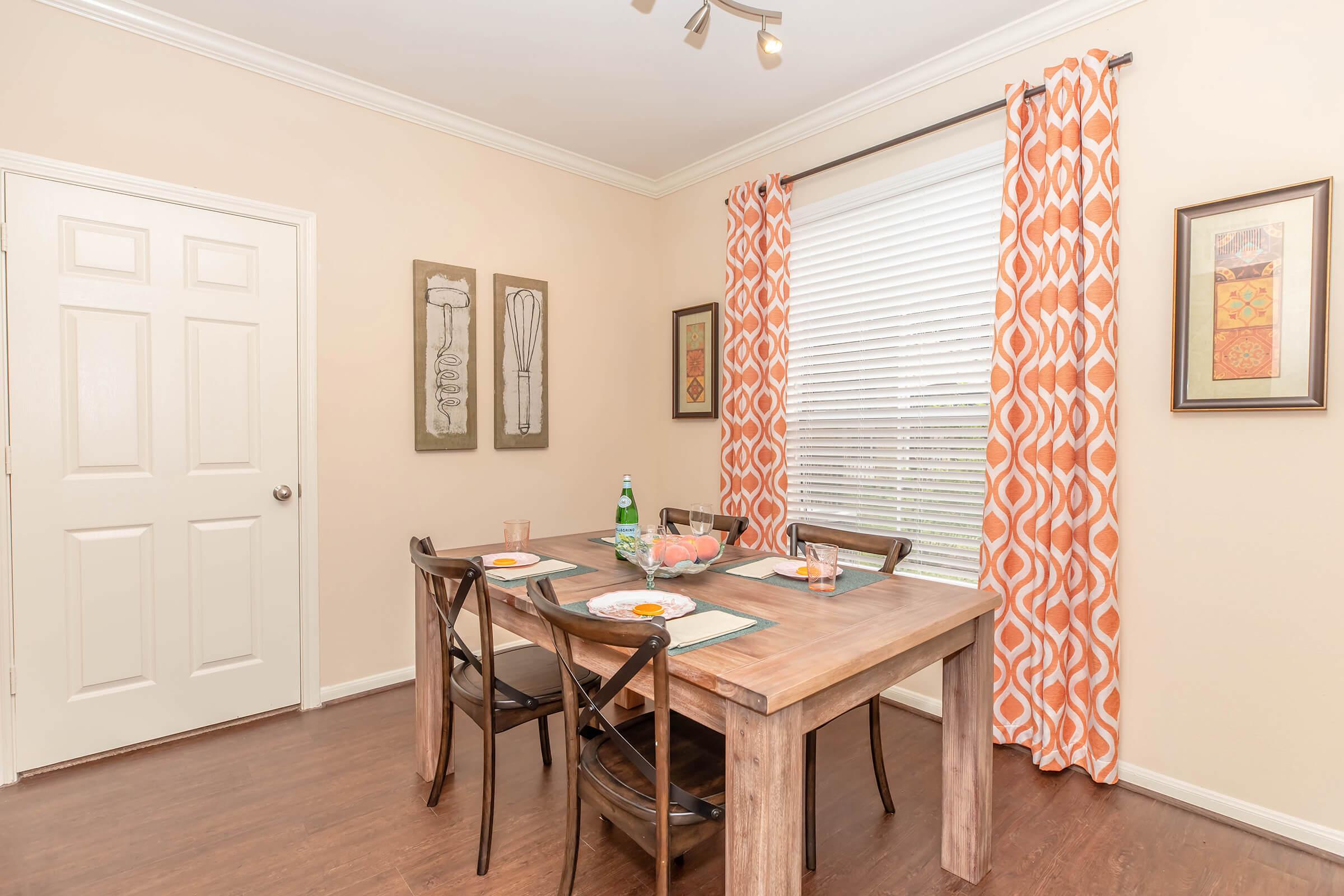 a room filled with furniture and a table