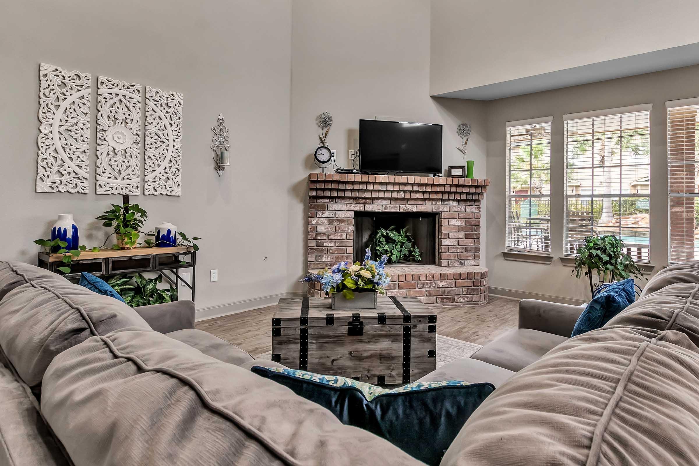 a bedroom with a bed and window in a room