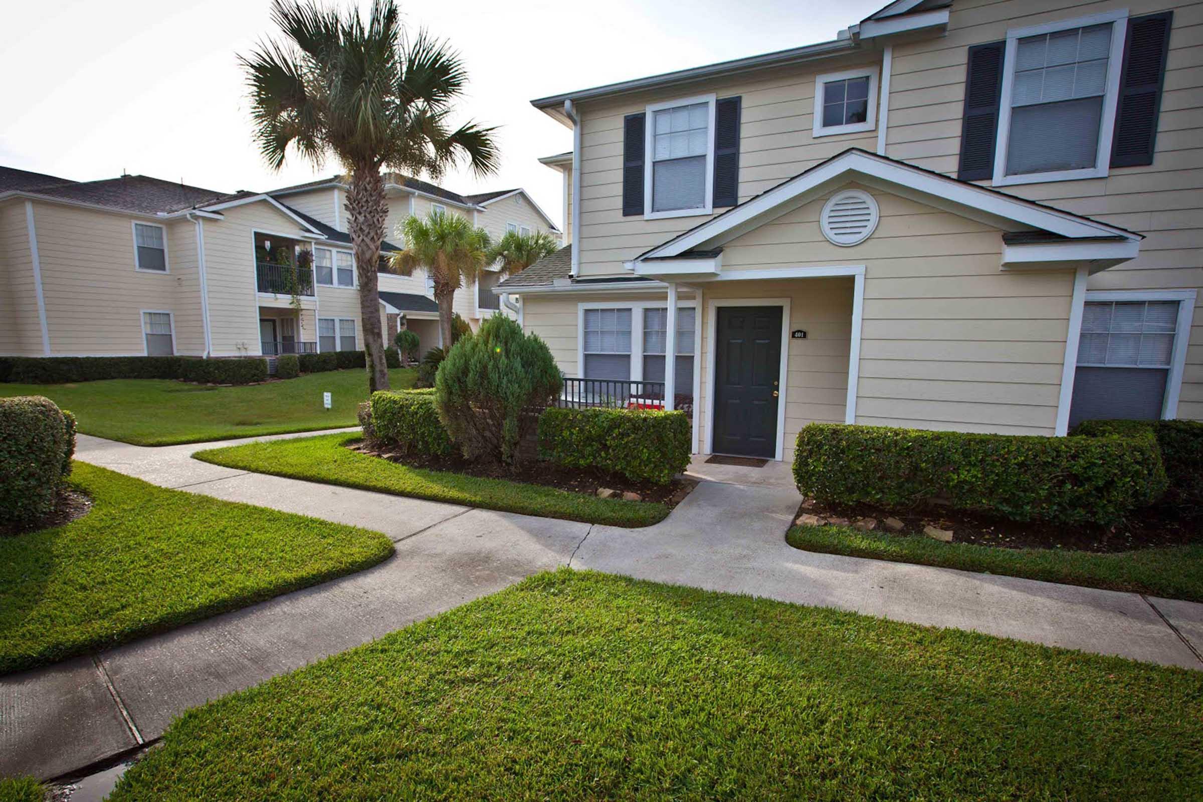 a large lawn in front of a house