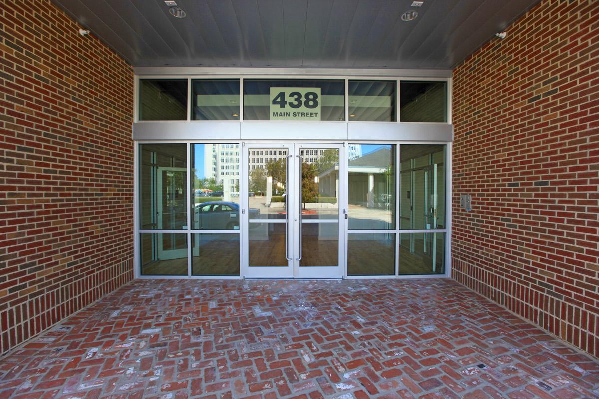 a room with a large red brick building