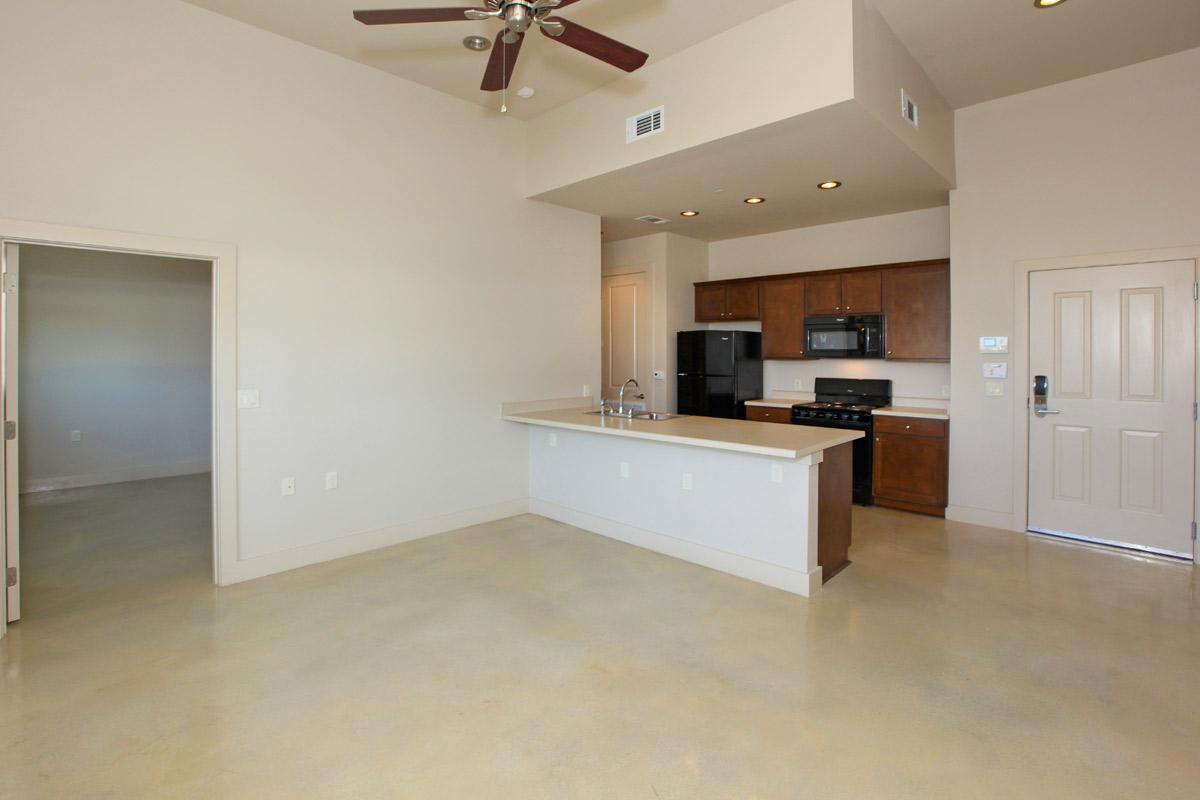 a kitchen with a wood floor