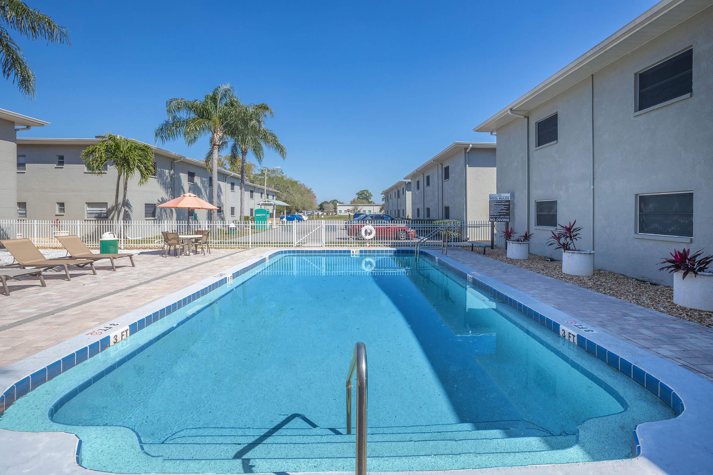 a pool next to a building