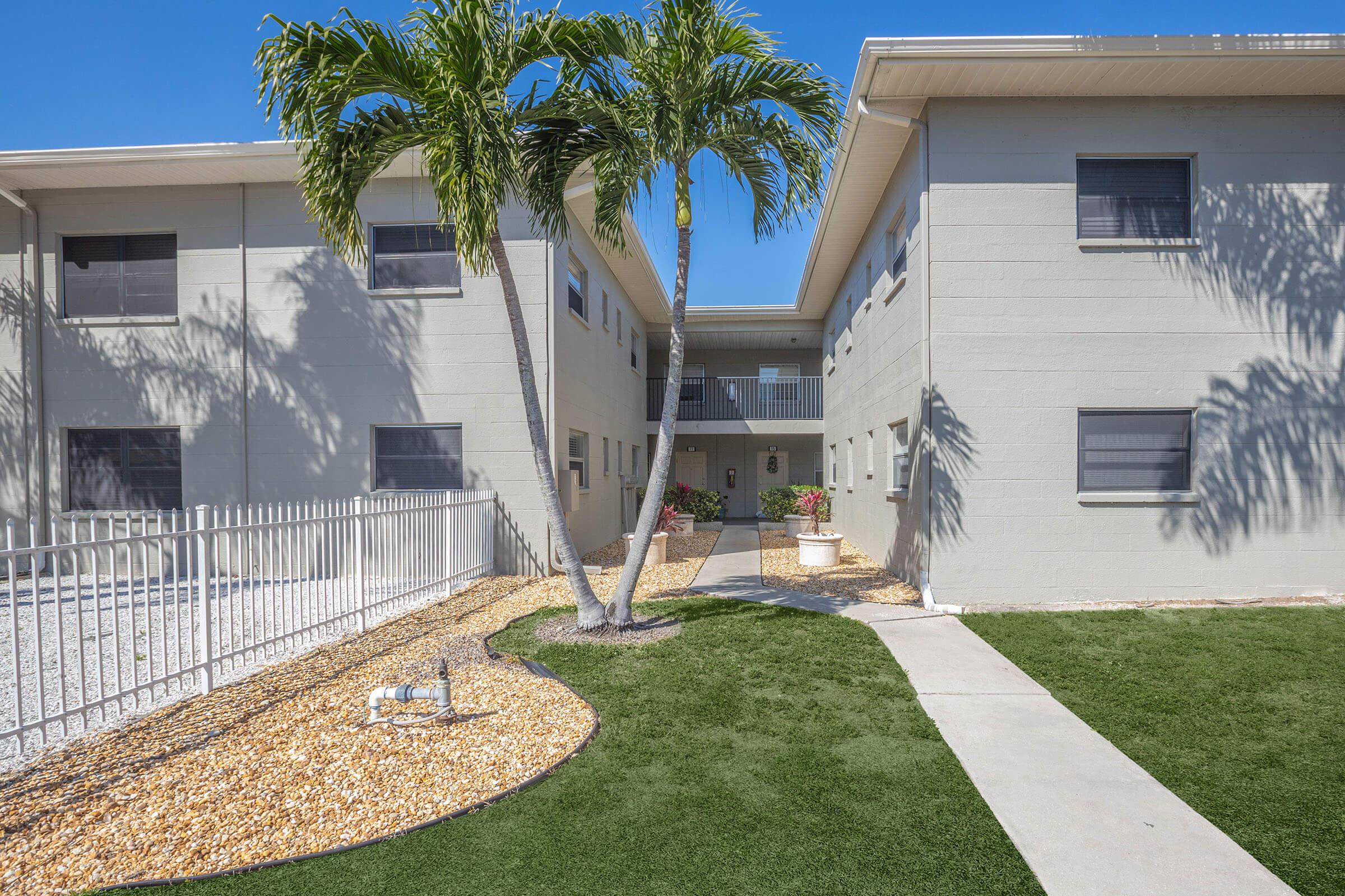 a large lawn in front of a house