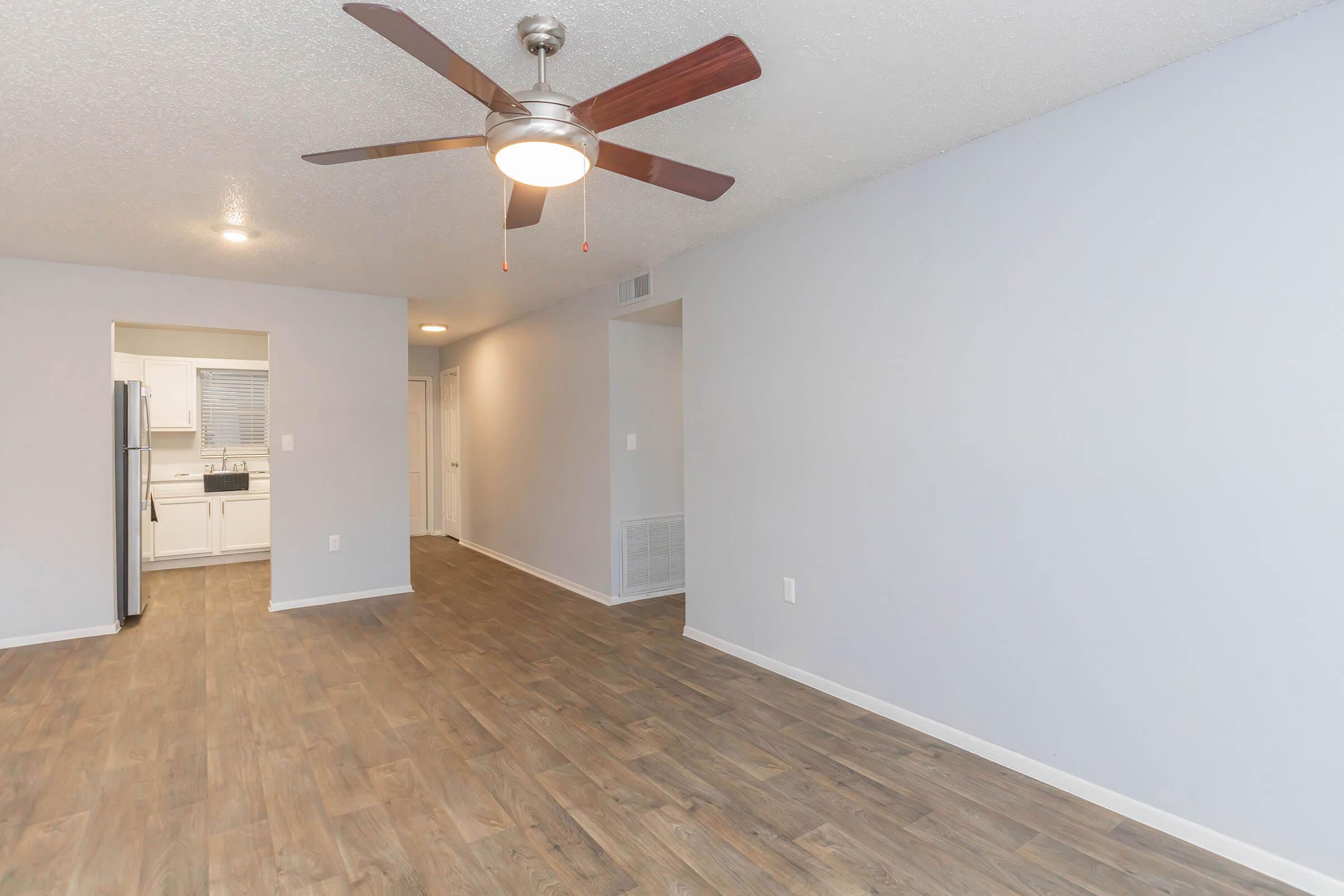 a kitchen with a wooden floor