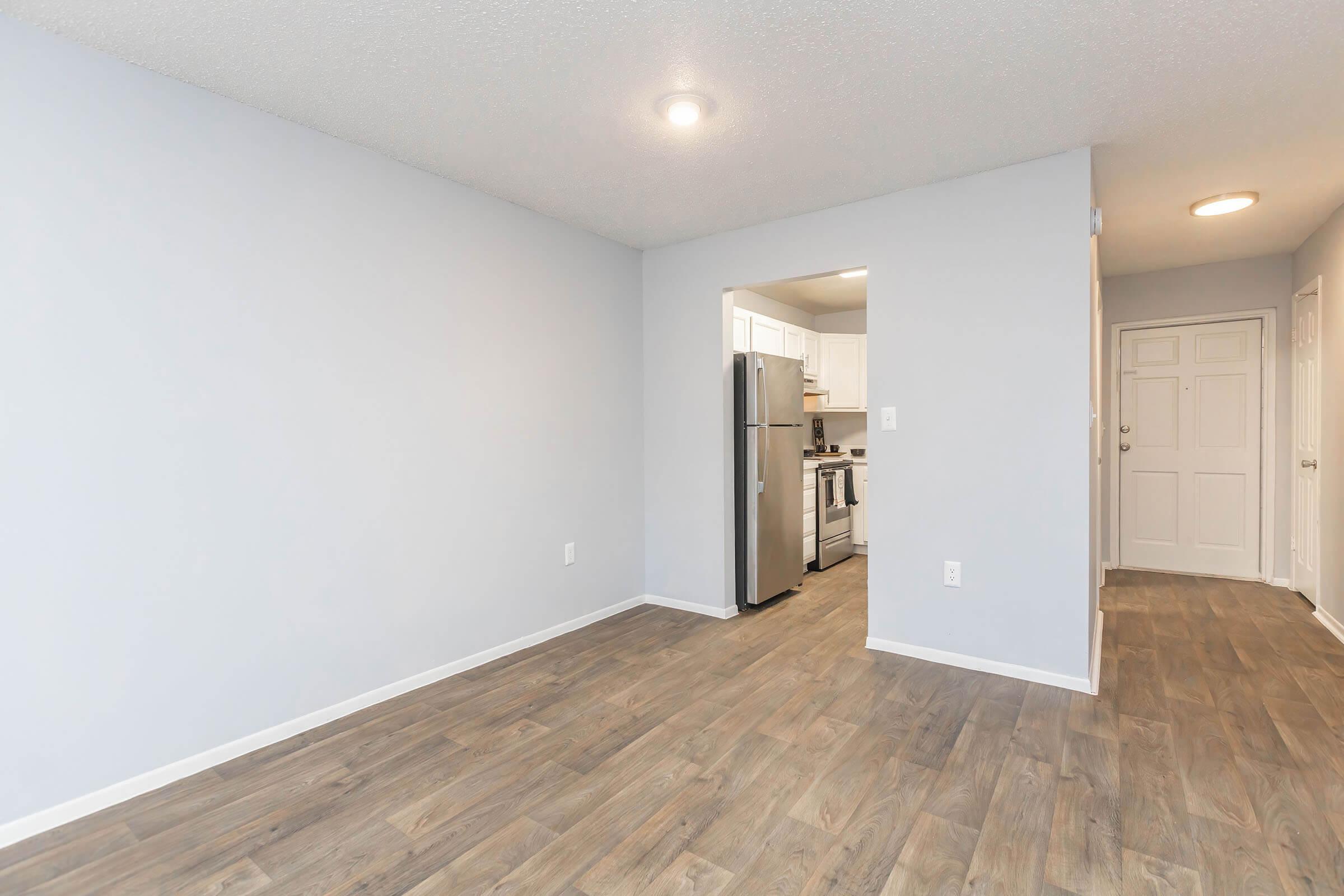 a kitchen with a wood floor