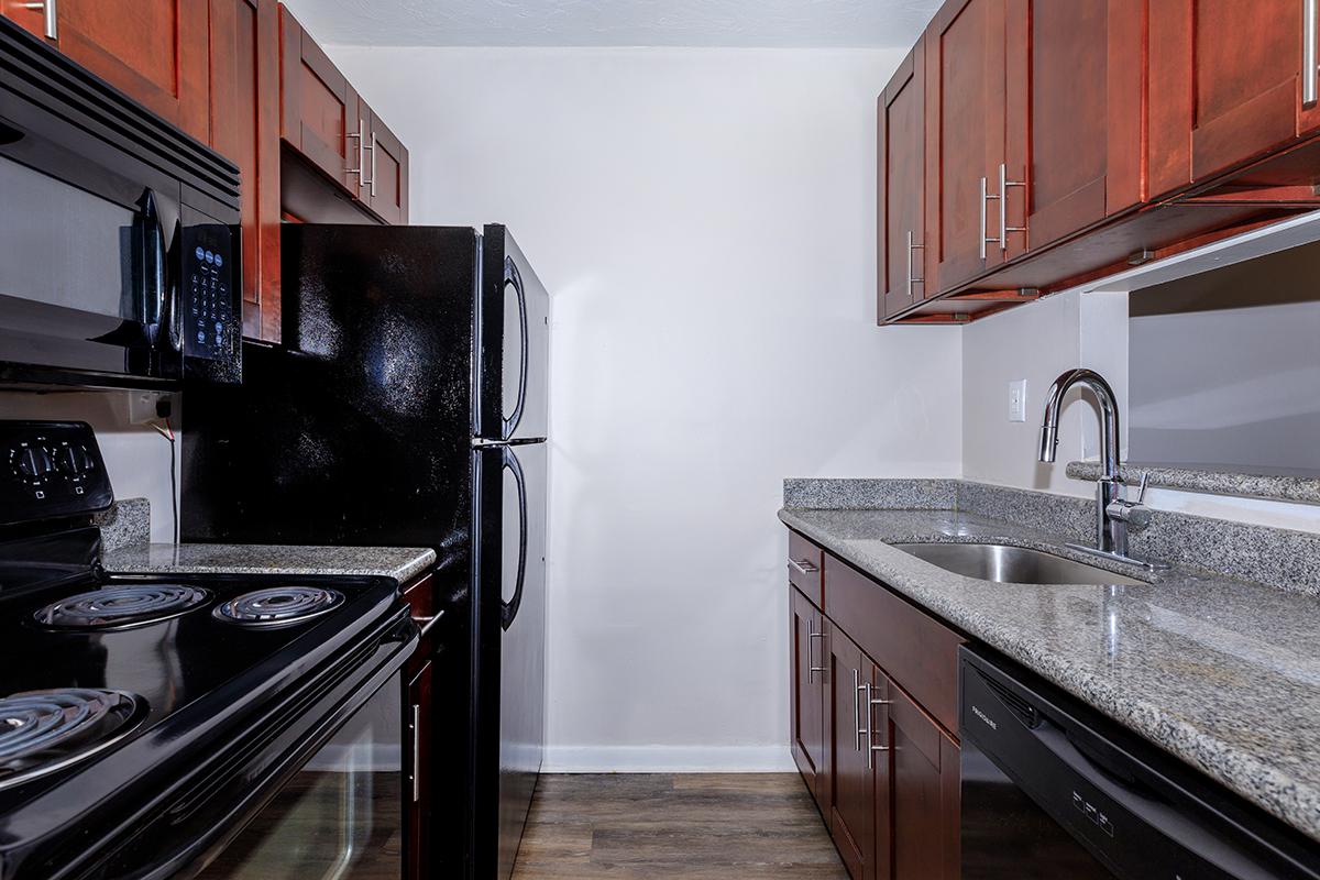 a modern kitchen with stainless steel appliances