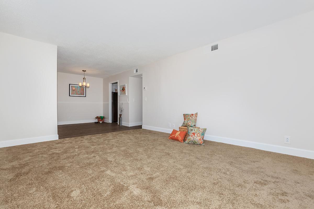 a bedroom with a bed in a room