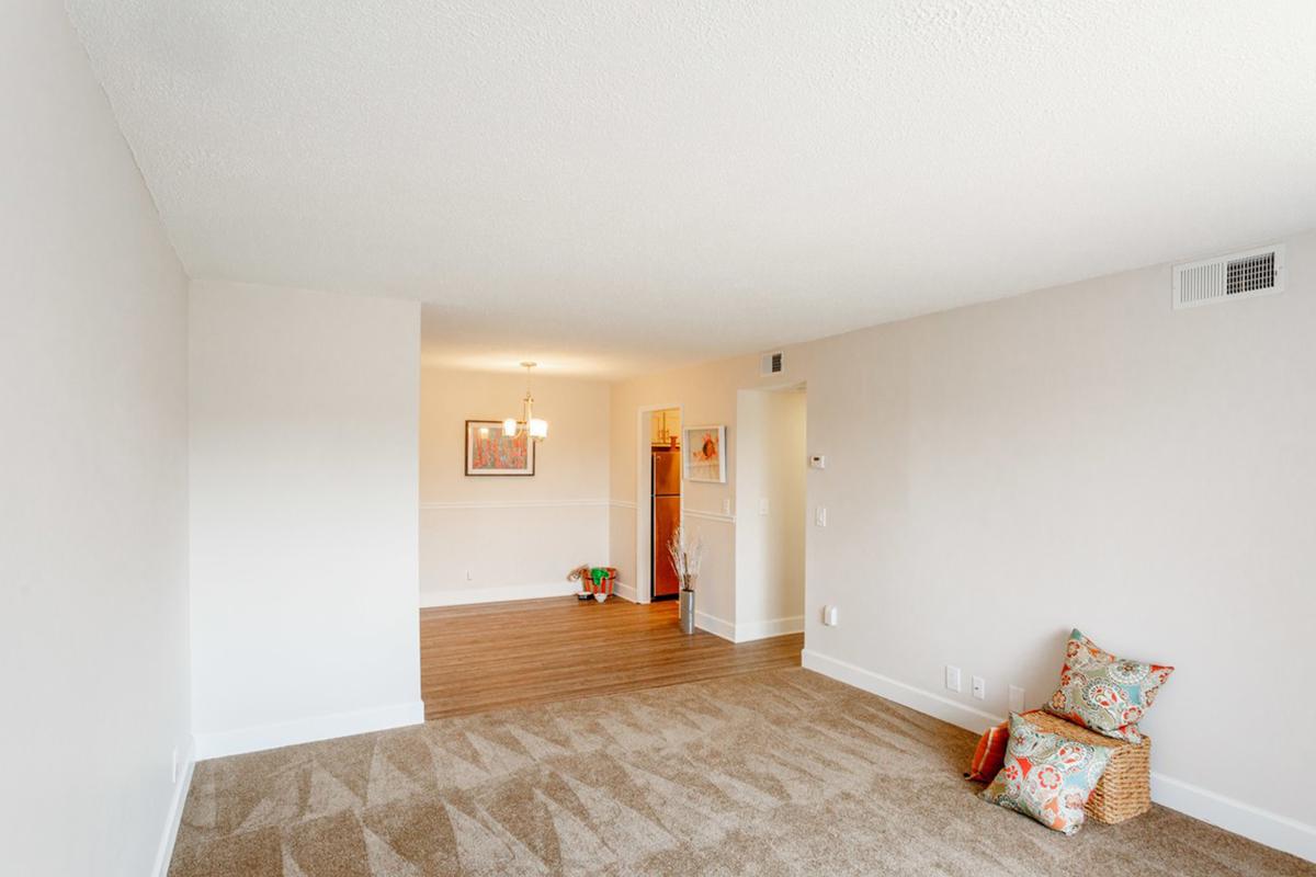 a bedroom with a bed in a room