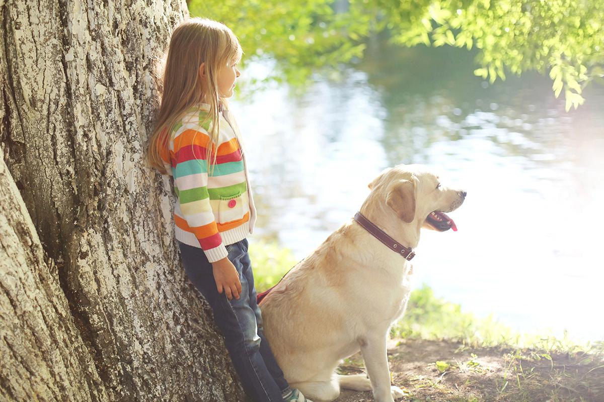 exterior-girl and dog by water.jpg
