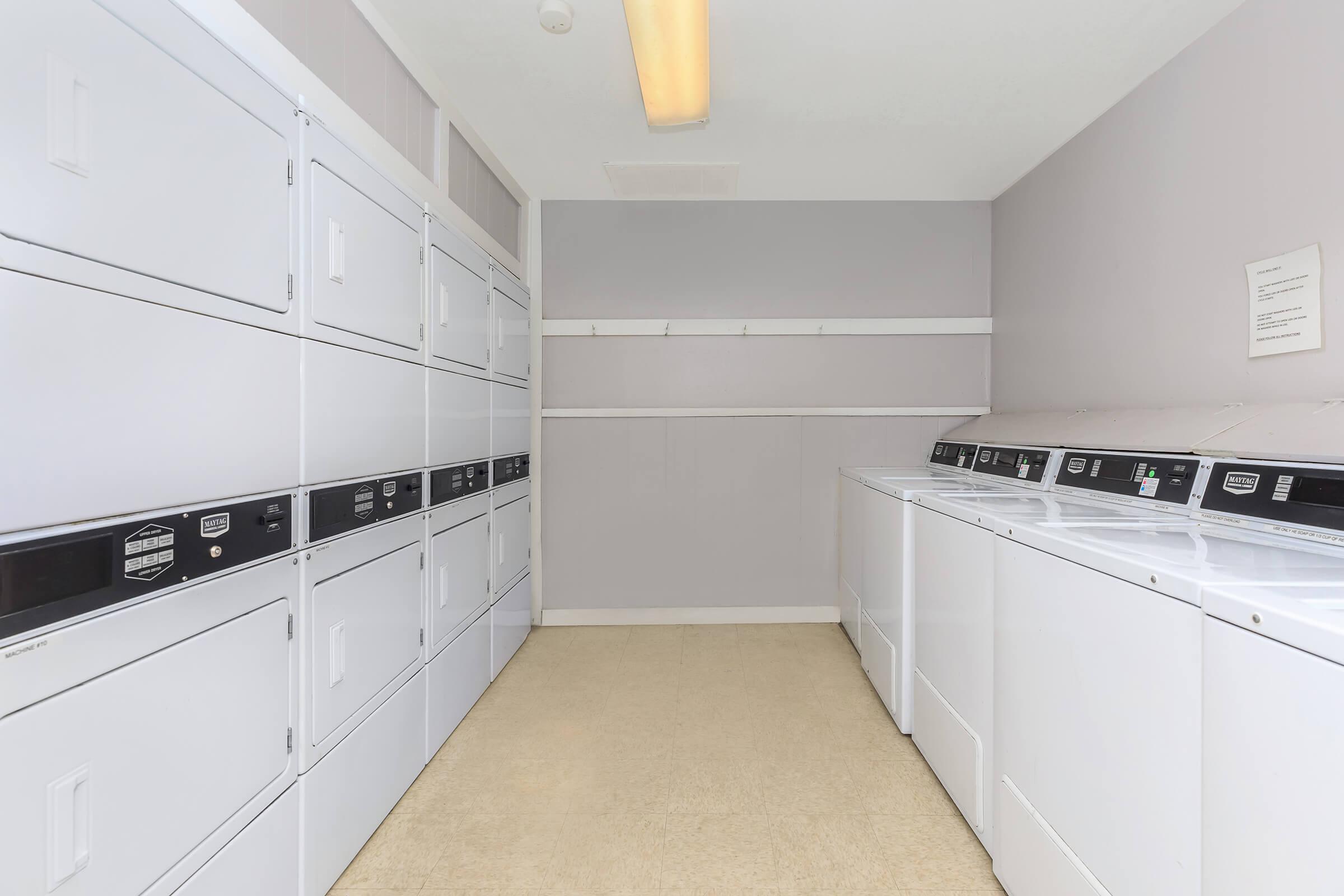 a kitchen with a stove and a refrigerator