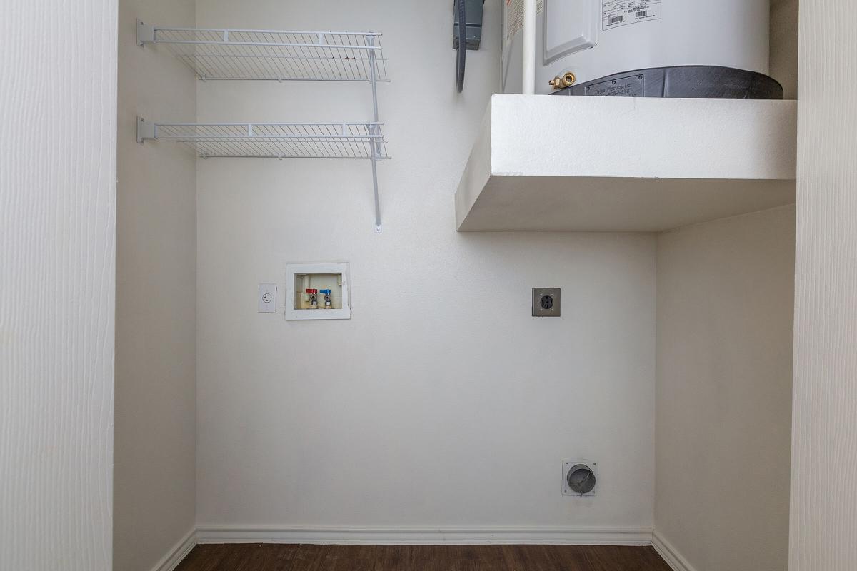 a white sink sitting next to a door