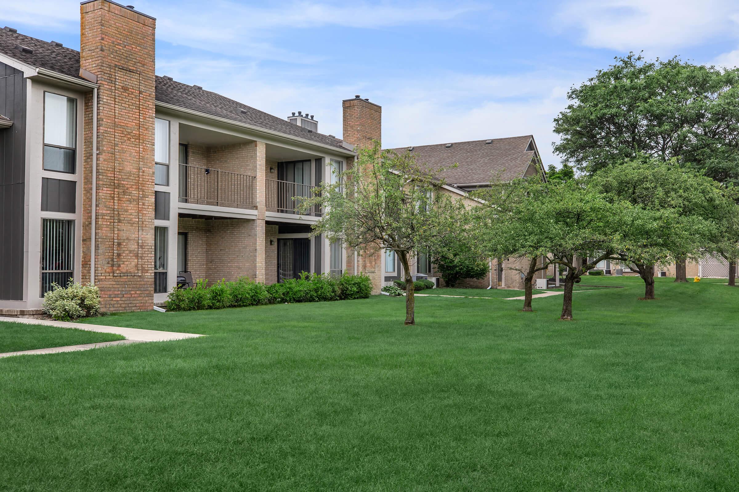 a large lawn in front of a house