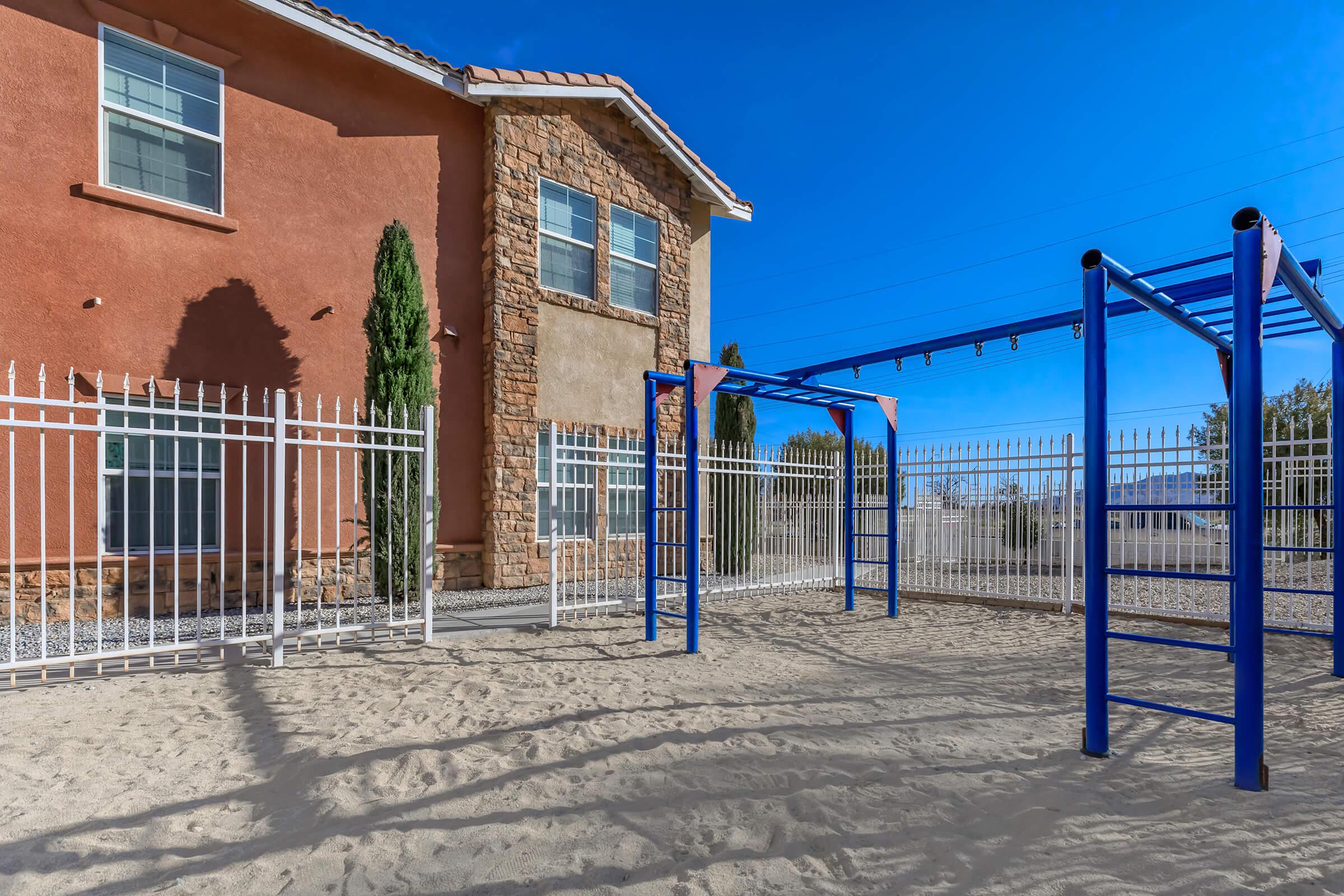 a building with a metal fence