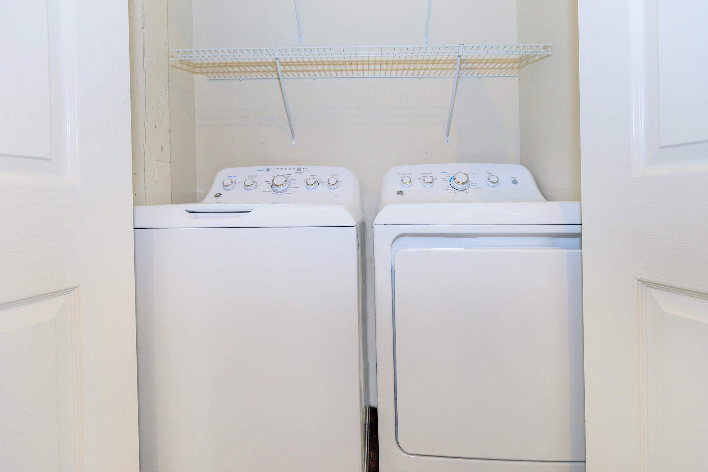 a stove top oven sitting inside of a refrigerator