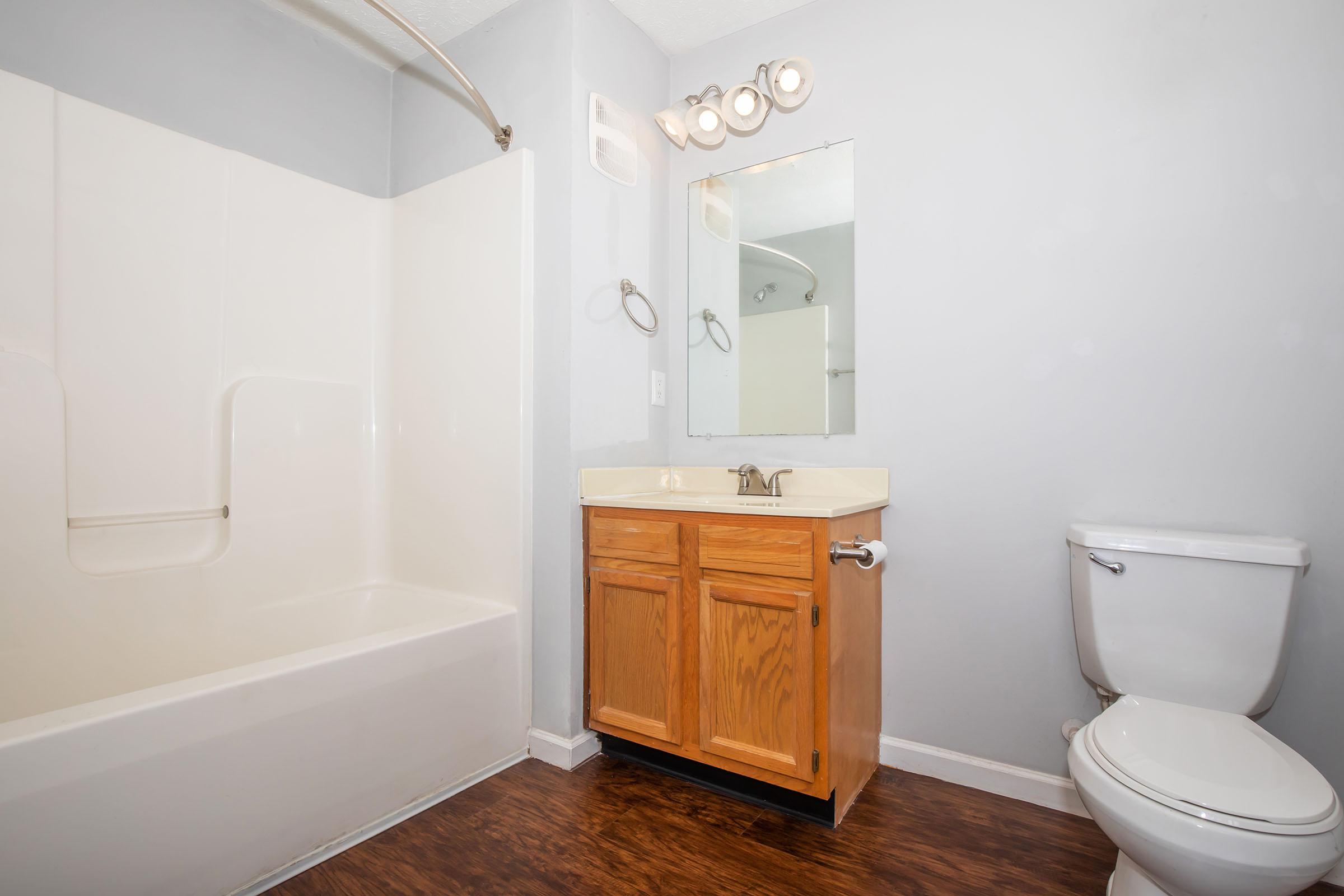 a room with a sink and a shower