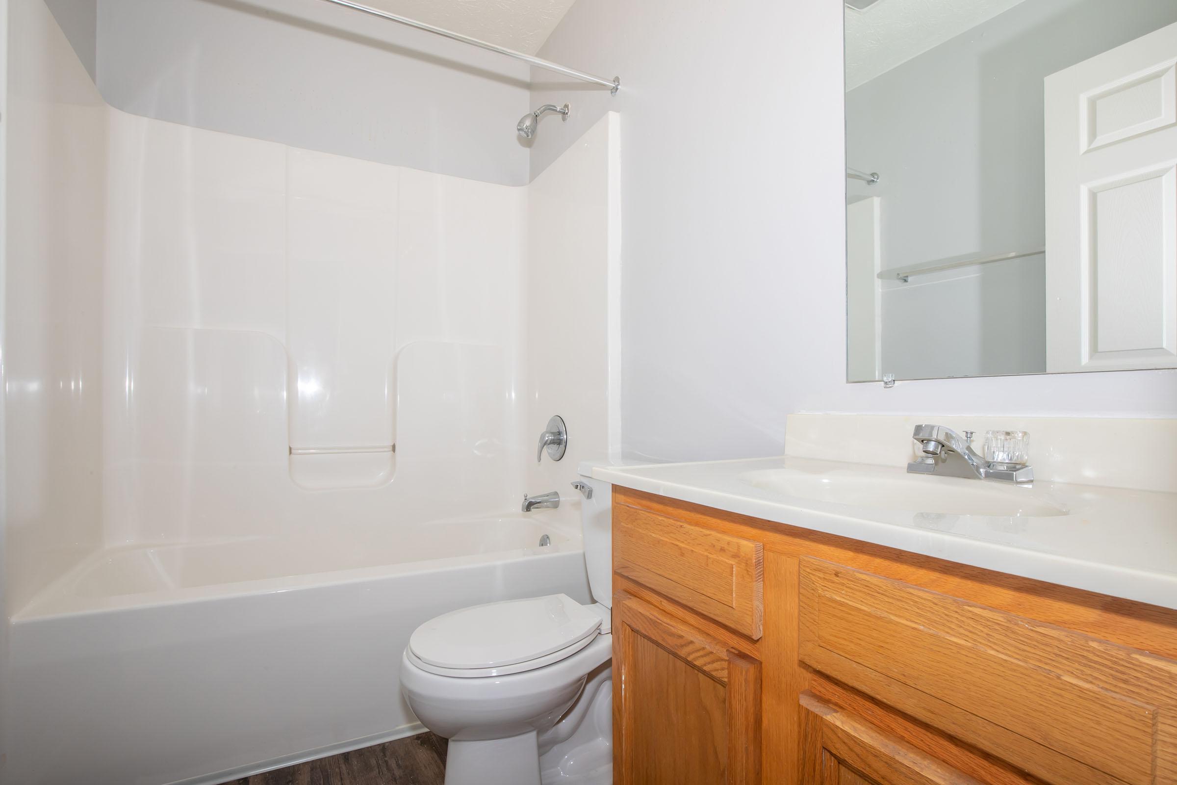 a room with a sink and a shower