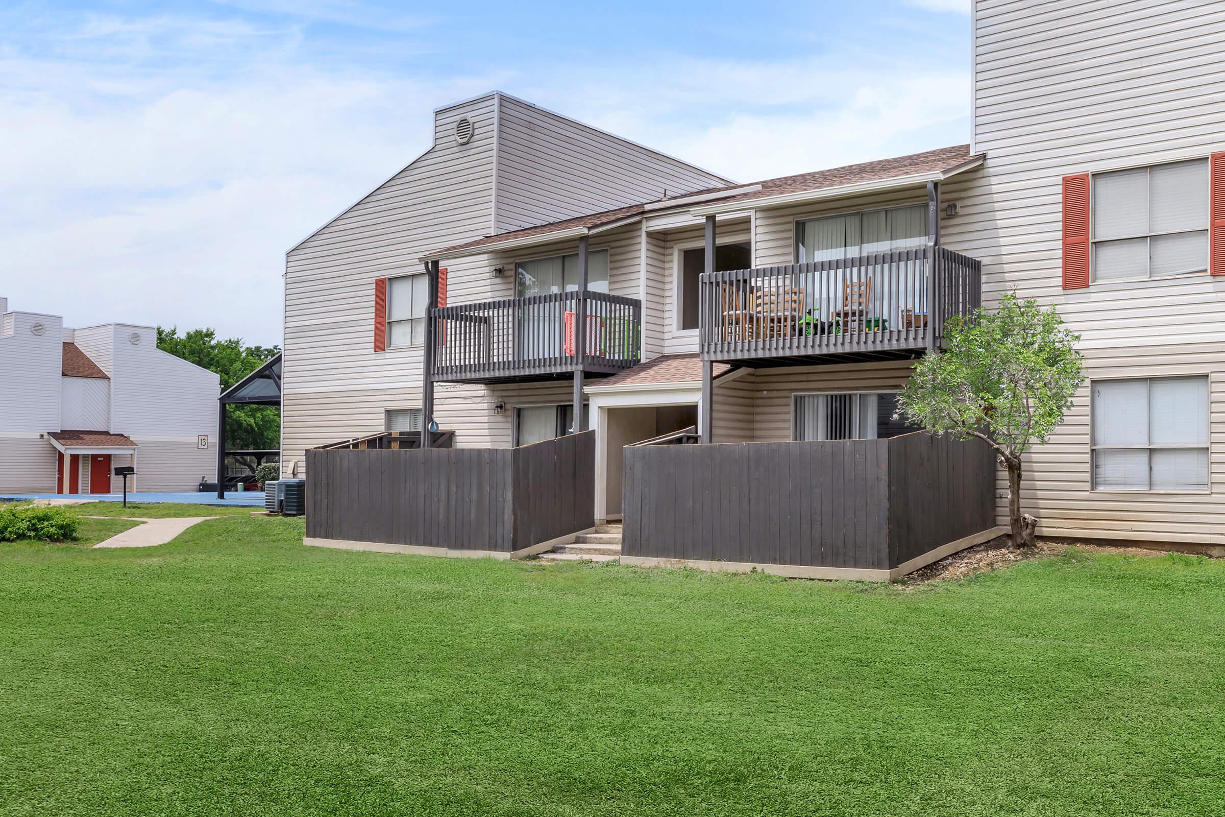 a large lawn in front of a house