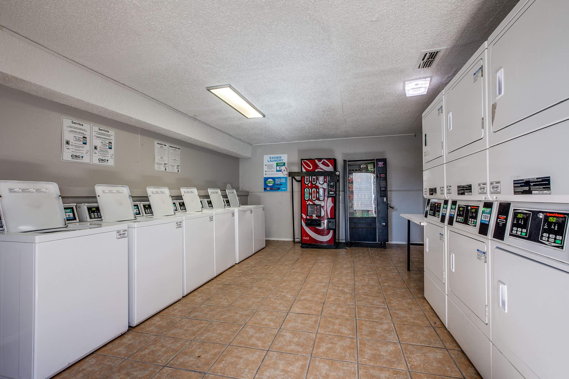 a kitchen with a stove and a refrigerator