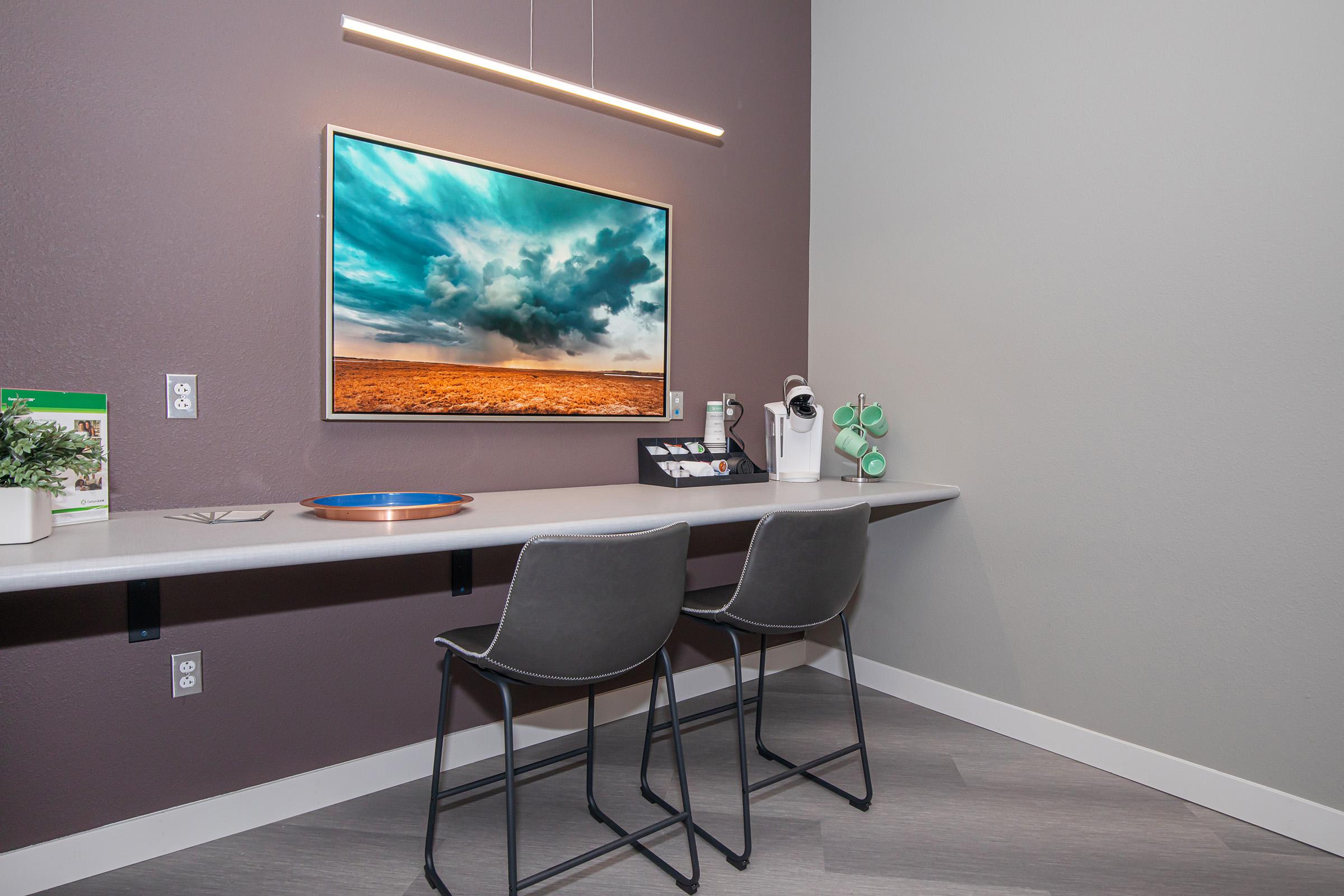 a flat screen tv sitting on top of a table