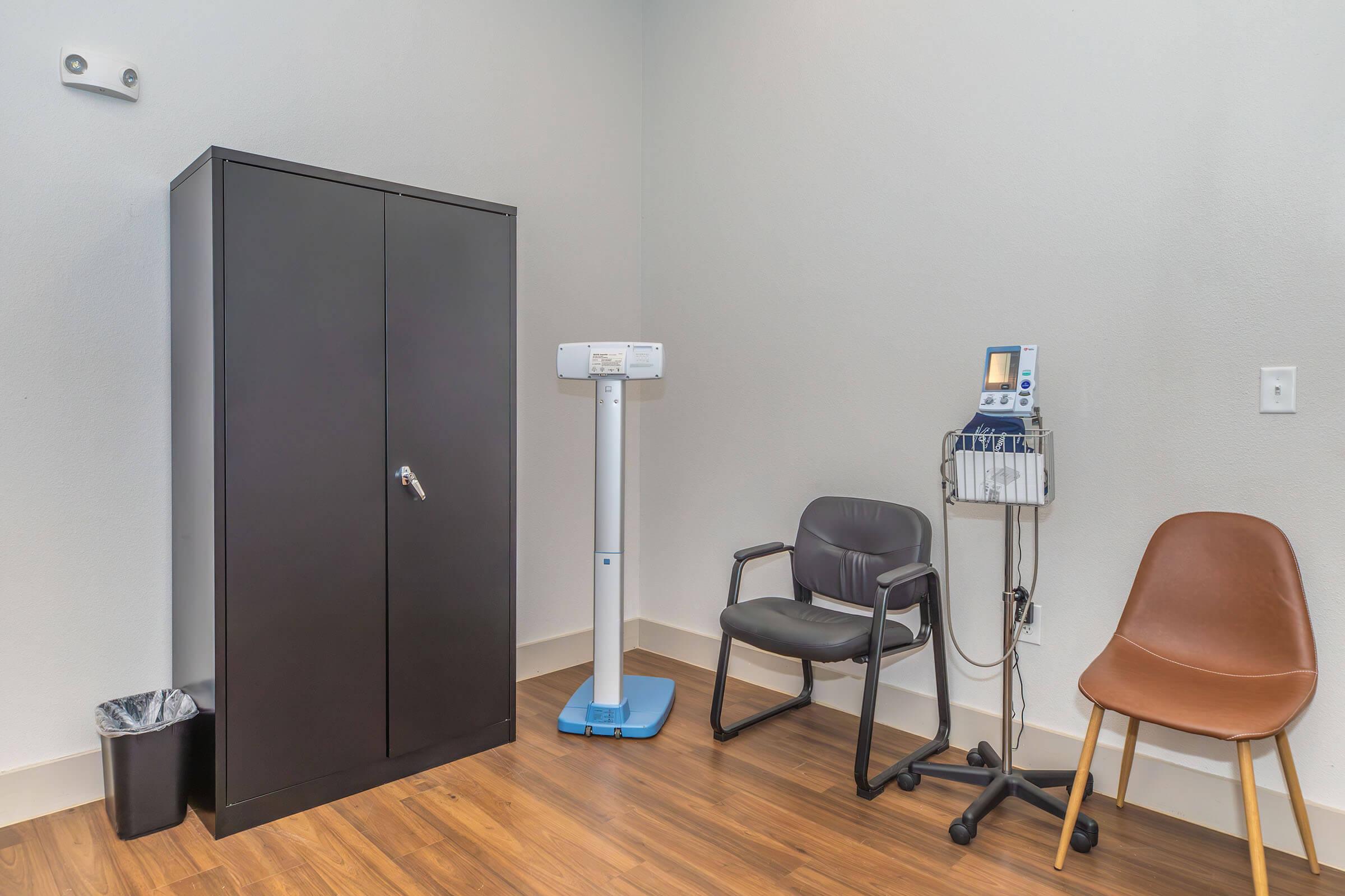 a desk with a chair in a room