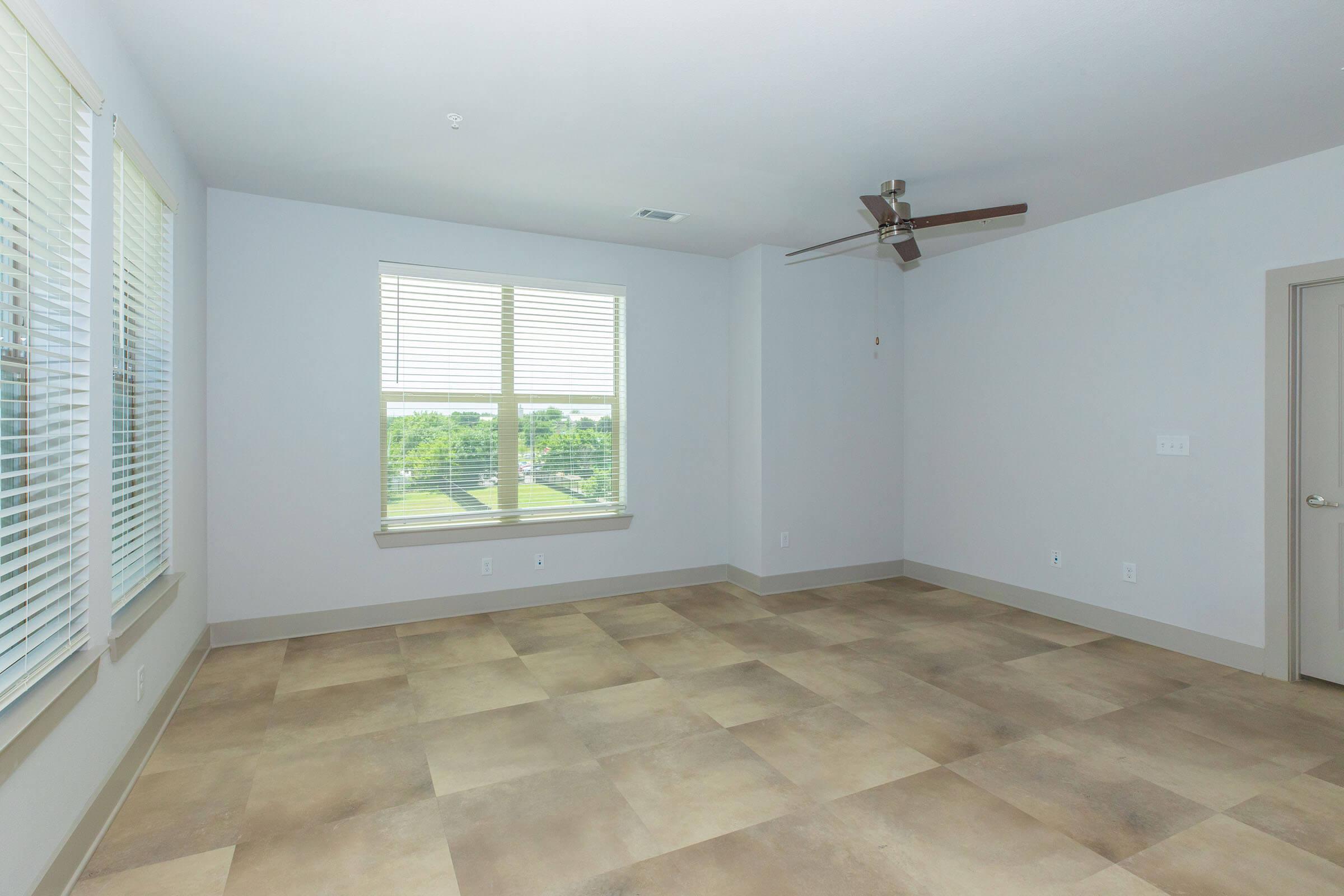 a view of a tiled floor next to a window