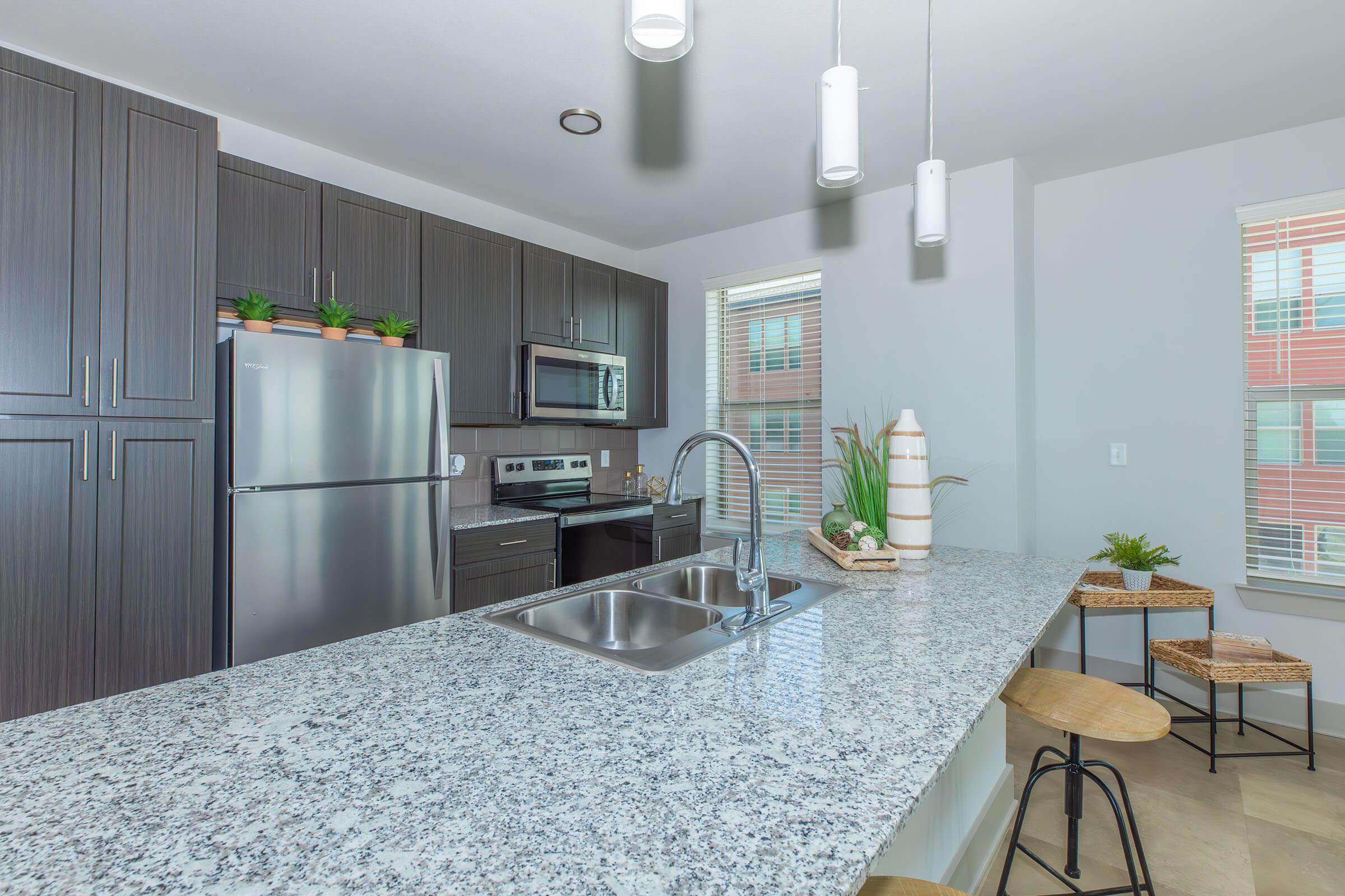 a kitchen with a large window