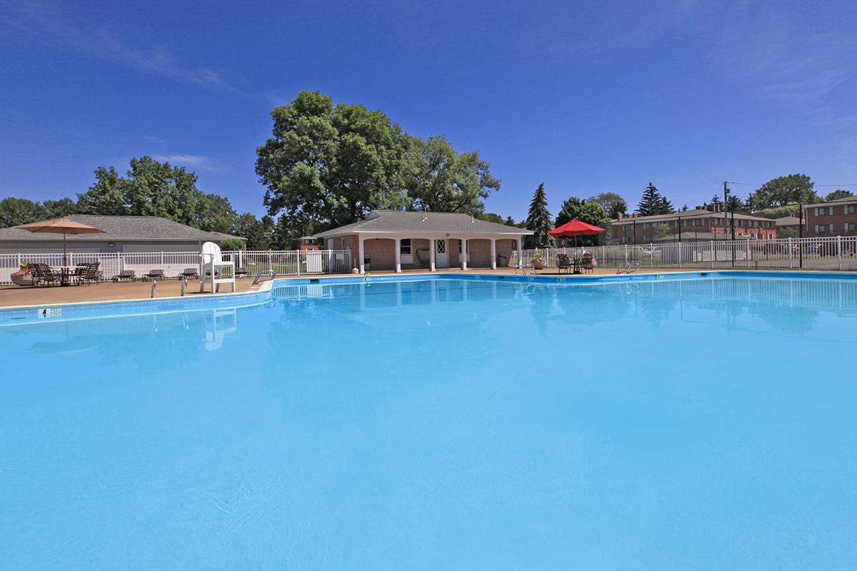 a pool next to a body of water