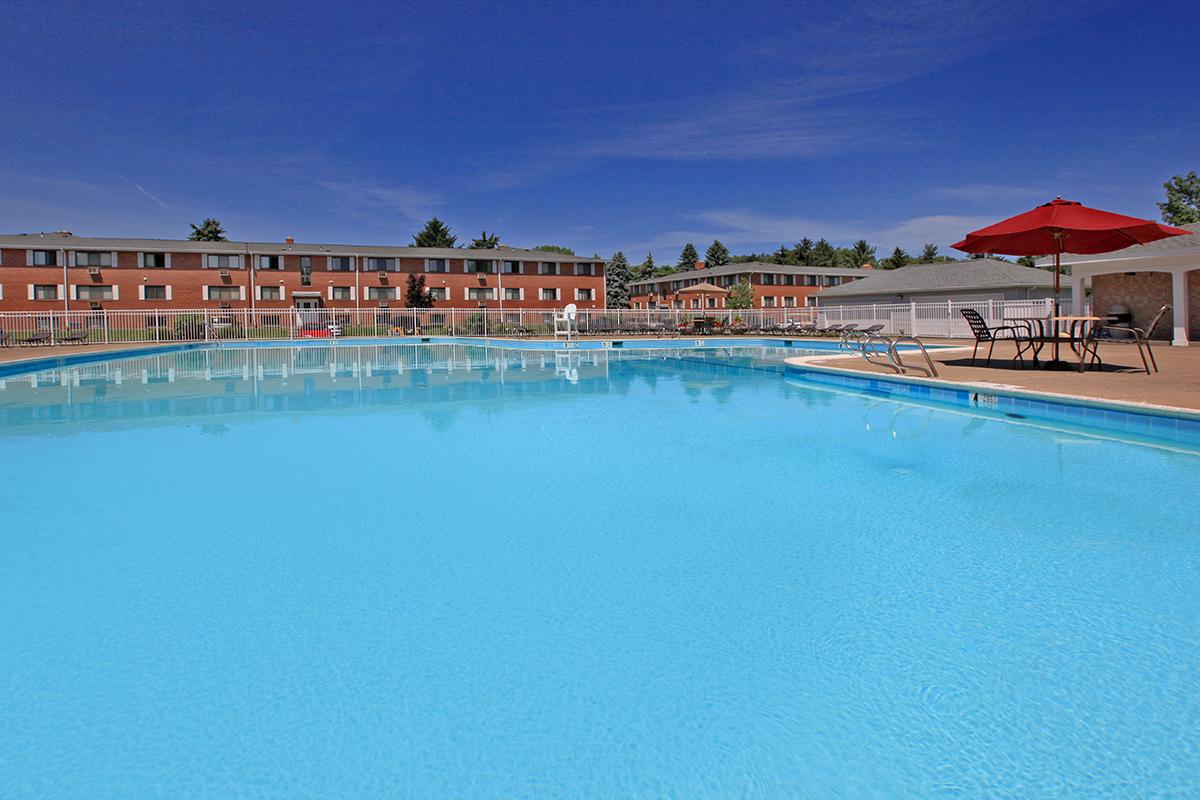 RELAX BY THE SHIMMERING POOL AT GREECE COMMONS