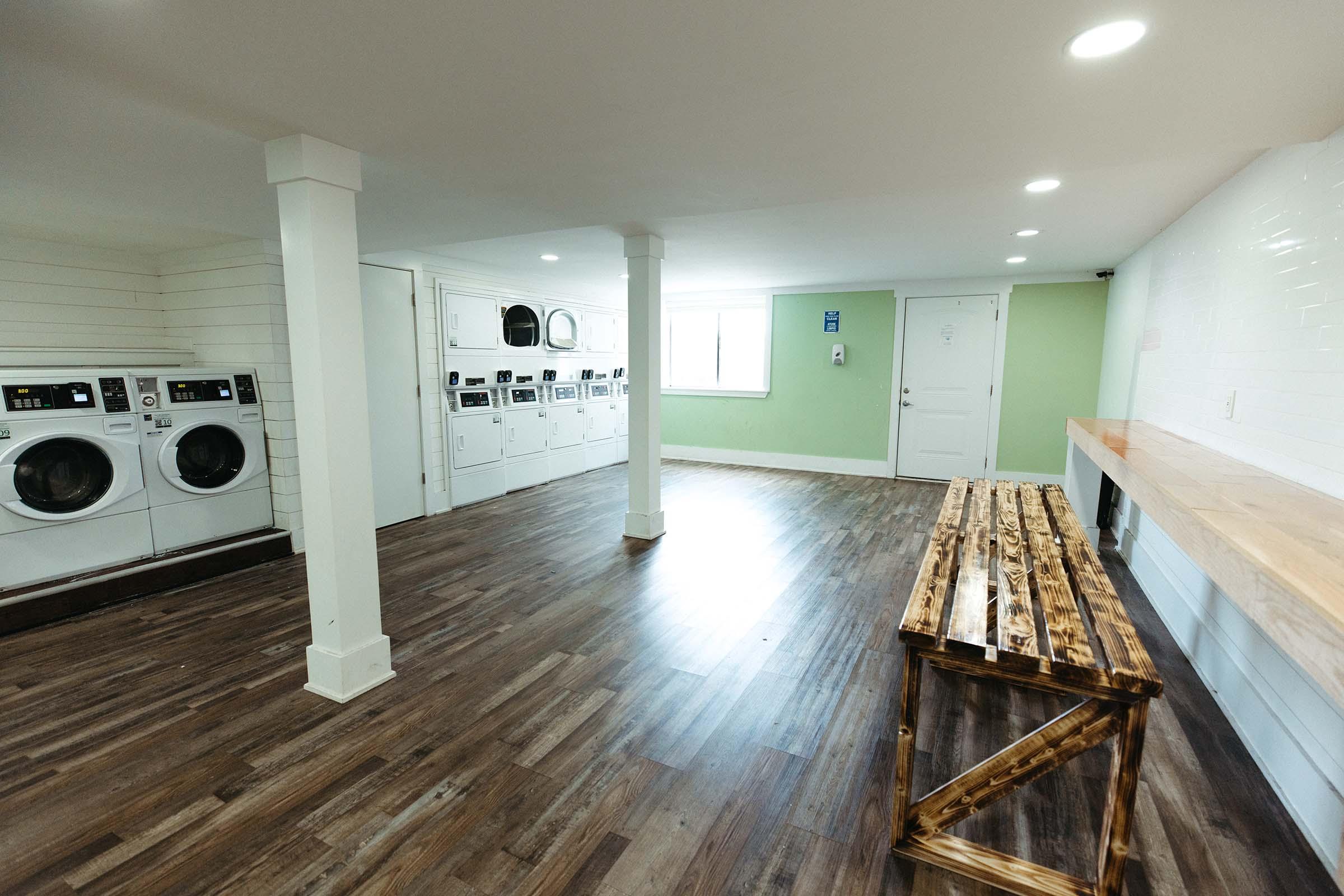 a kitchen with a wooden floor