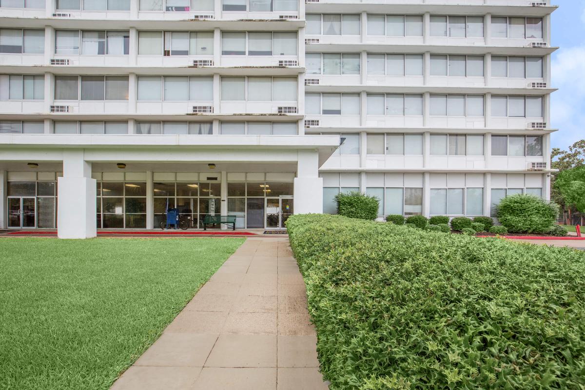 a building with green grass