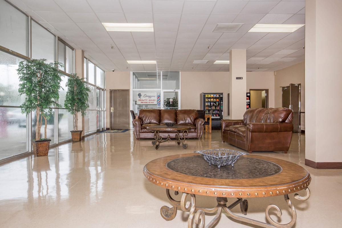 a room filled with furniture and a table