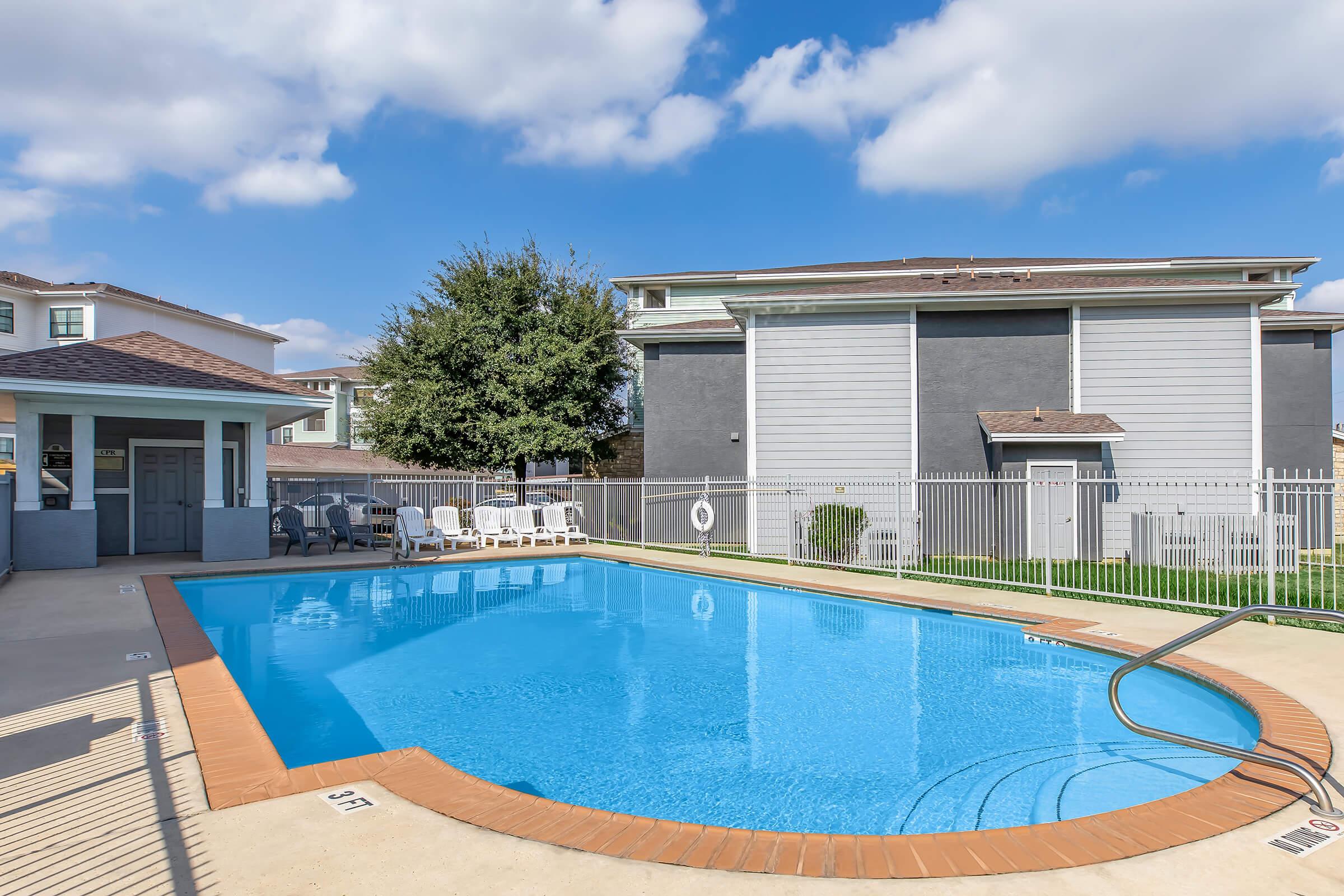 a pool next to a building