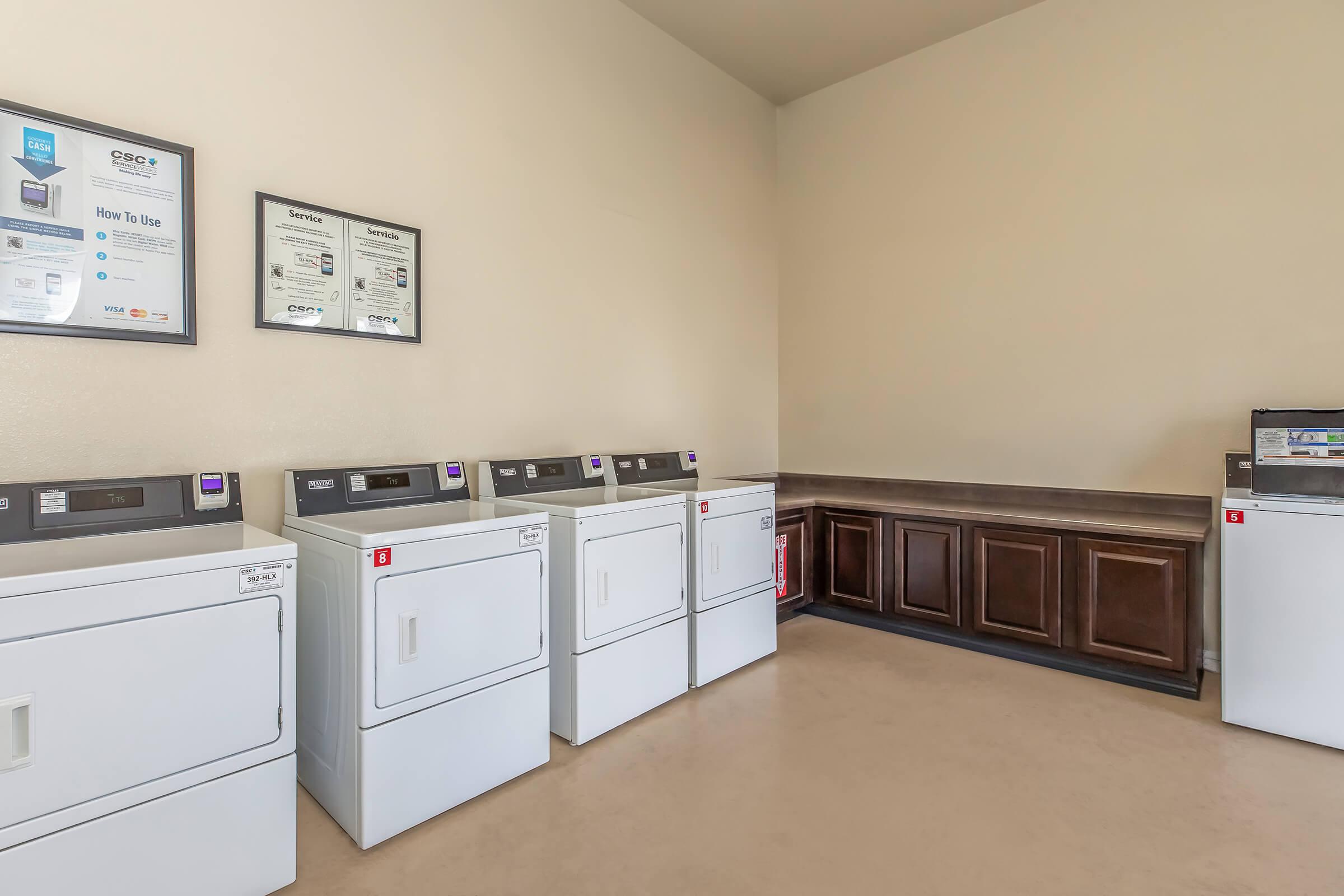 a kitchen with a stove and a refrigerator