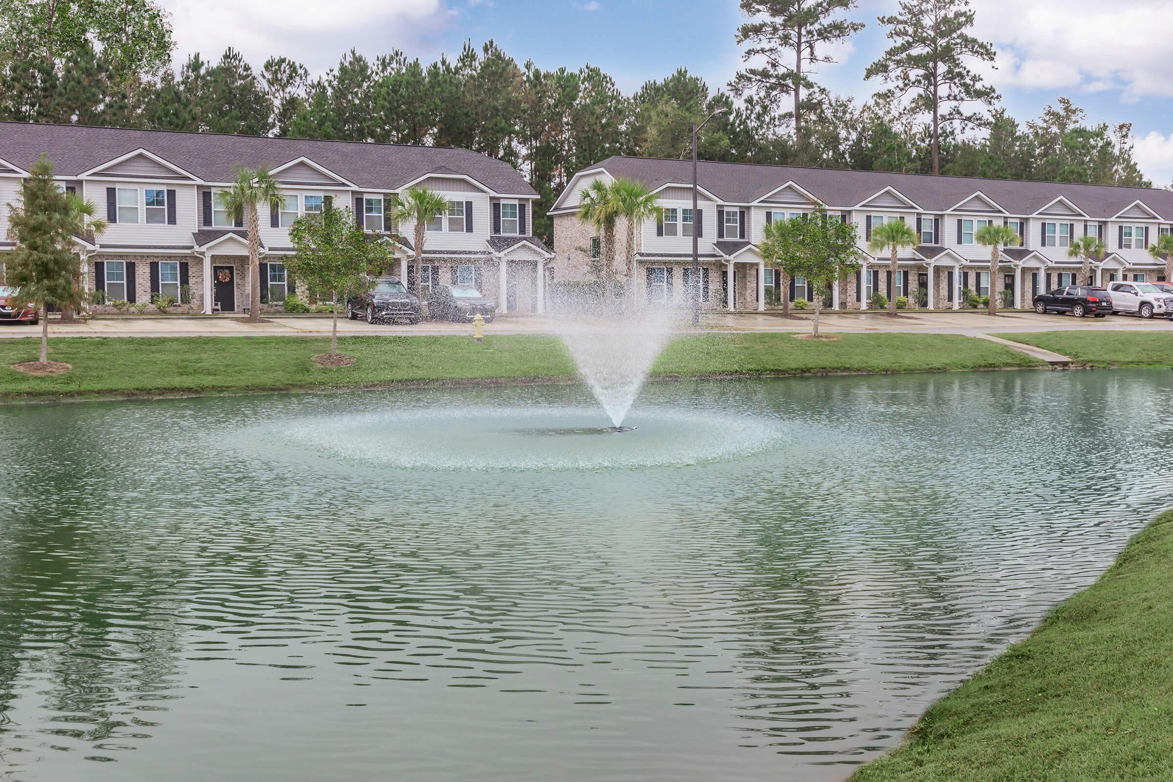 a small house surrounded by water