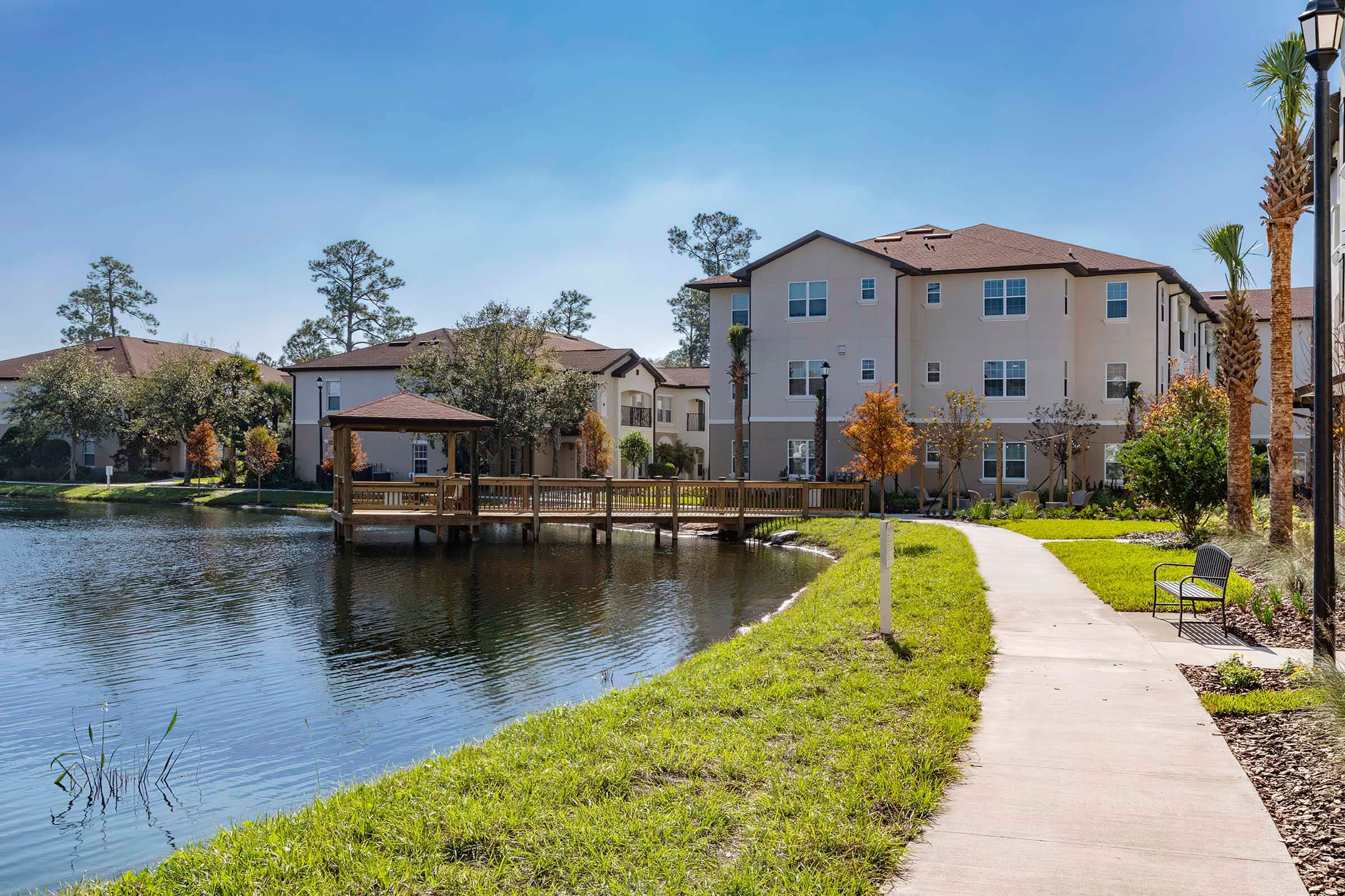 a small house surrounded by water