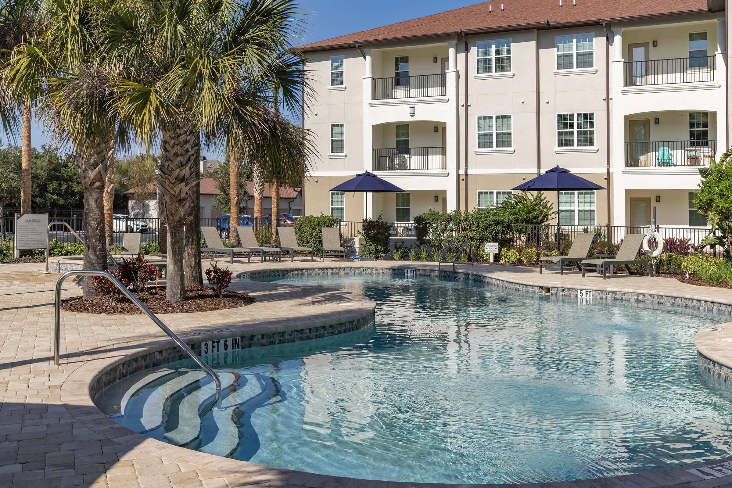 a house with a large pool of water