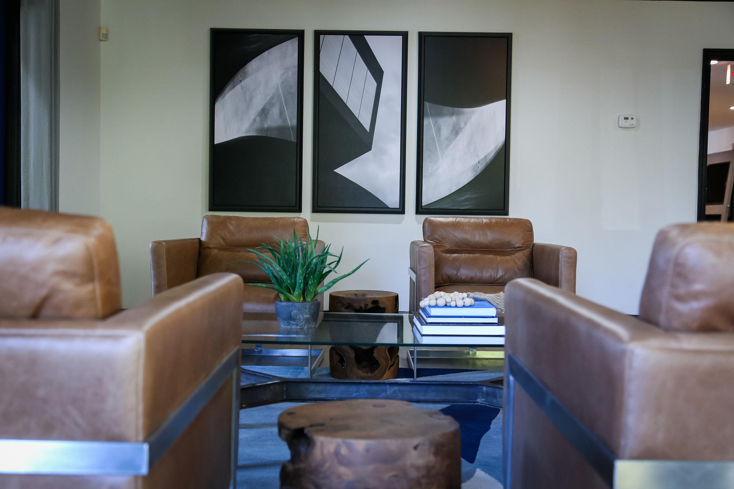 a living room filled with furniture and a fire place