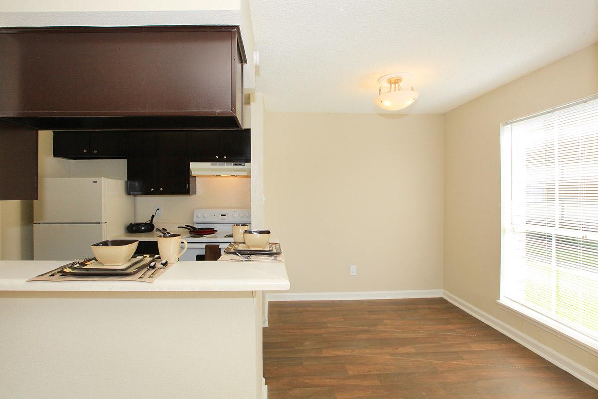 a kitchen with a sink and a microwave