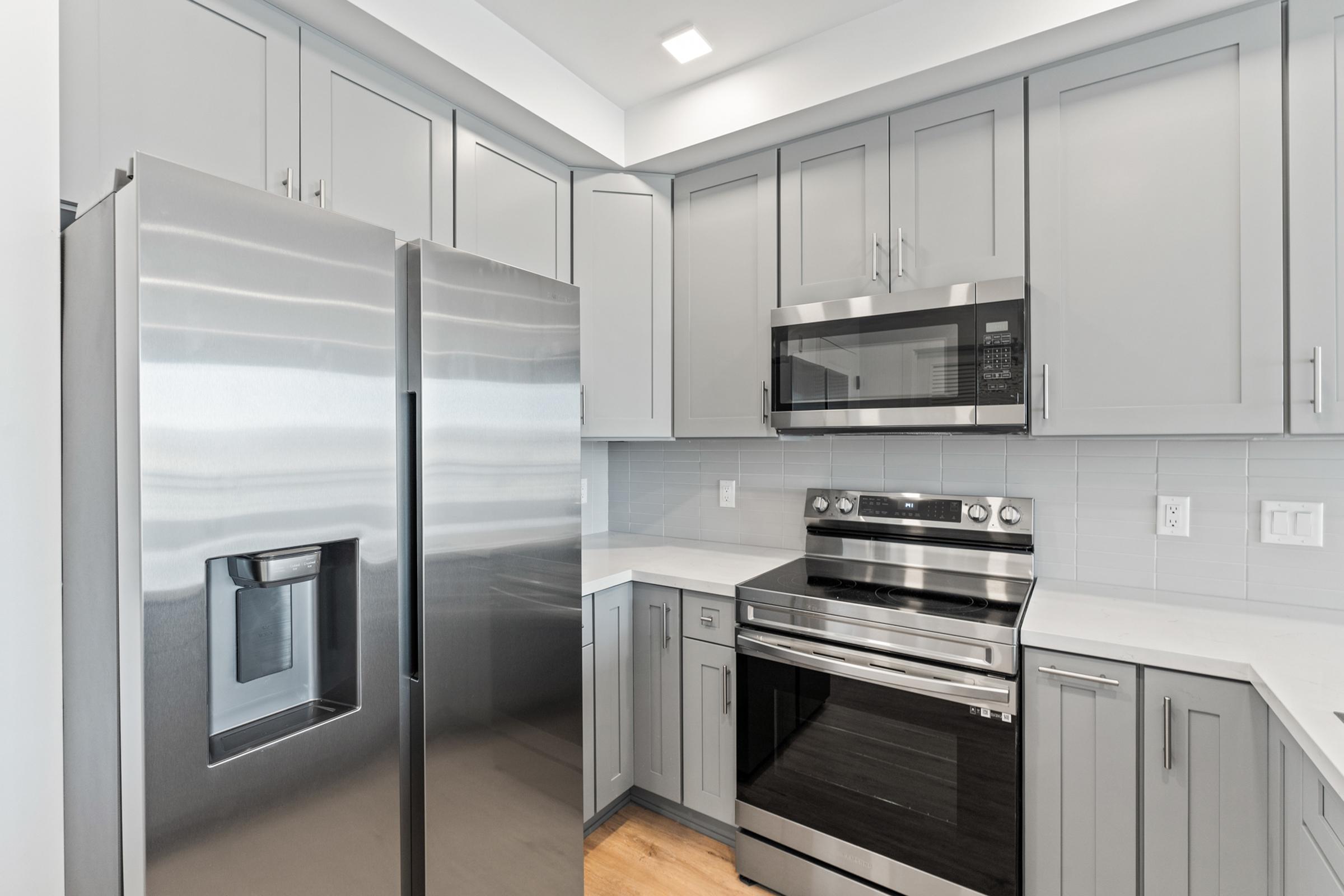 a stainless steel refrigerator in a kitchen