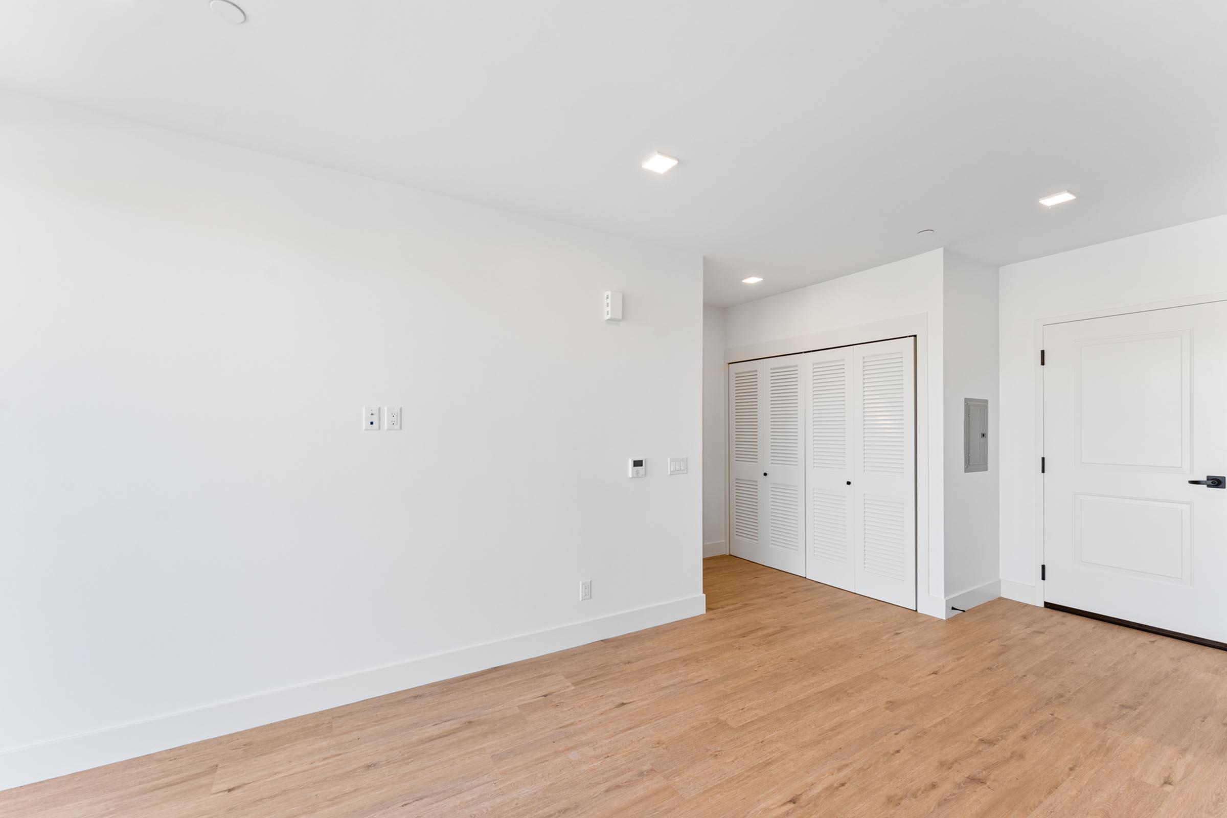 a kitchen with a wooden floor