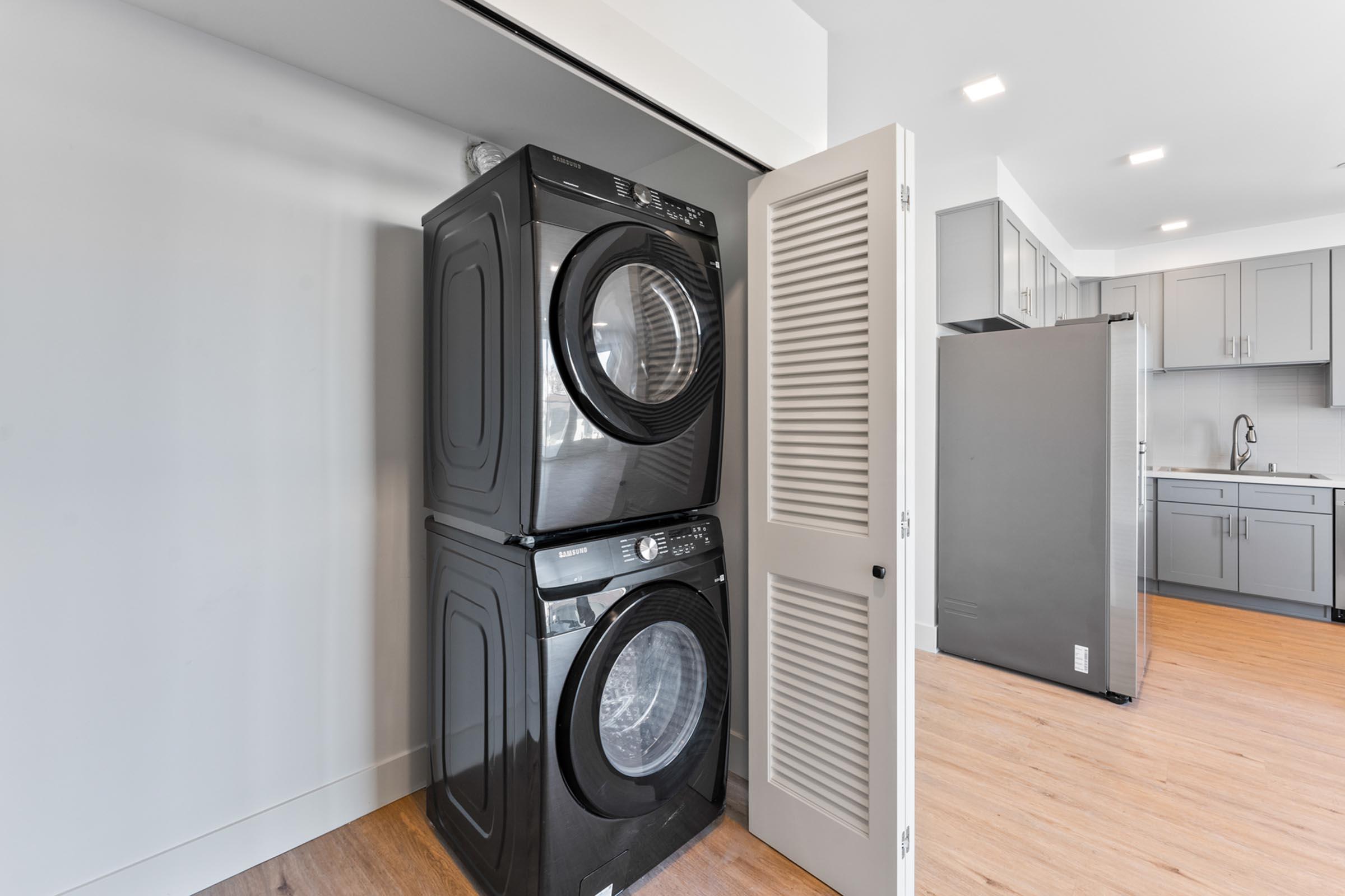 a microwave oven sitting on top of a wooden door