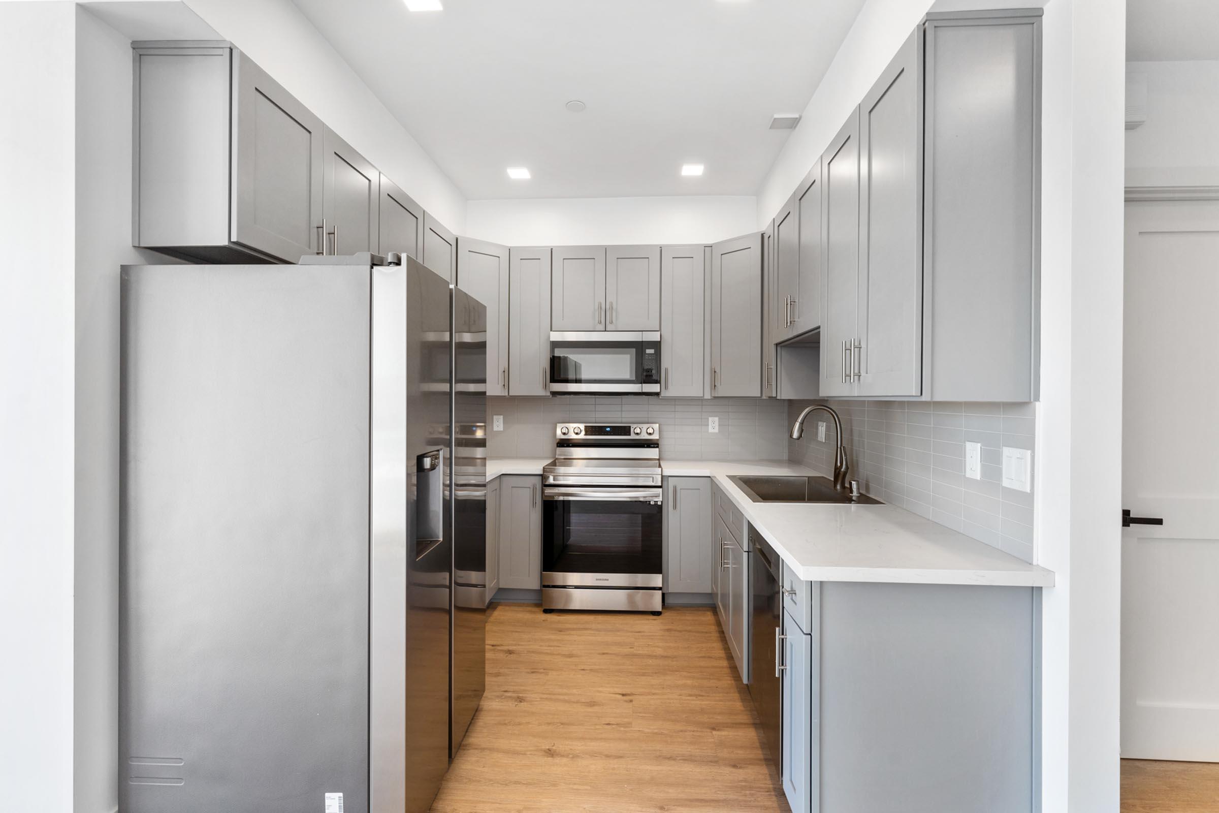 a stainless steel refrigerator in a kitchen