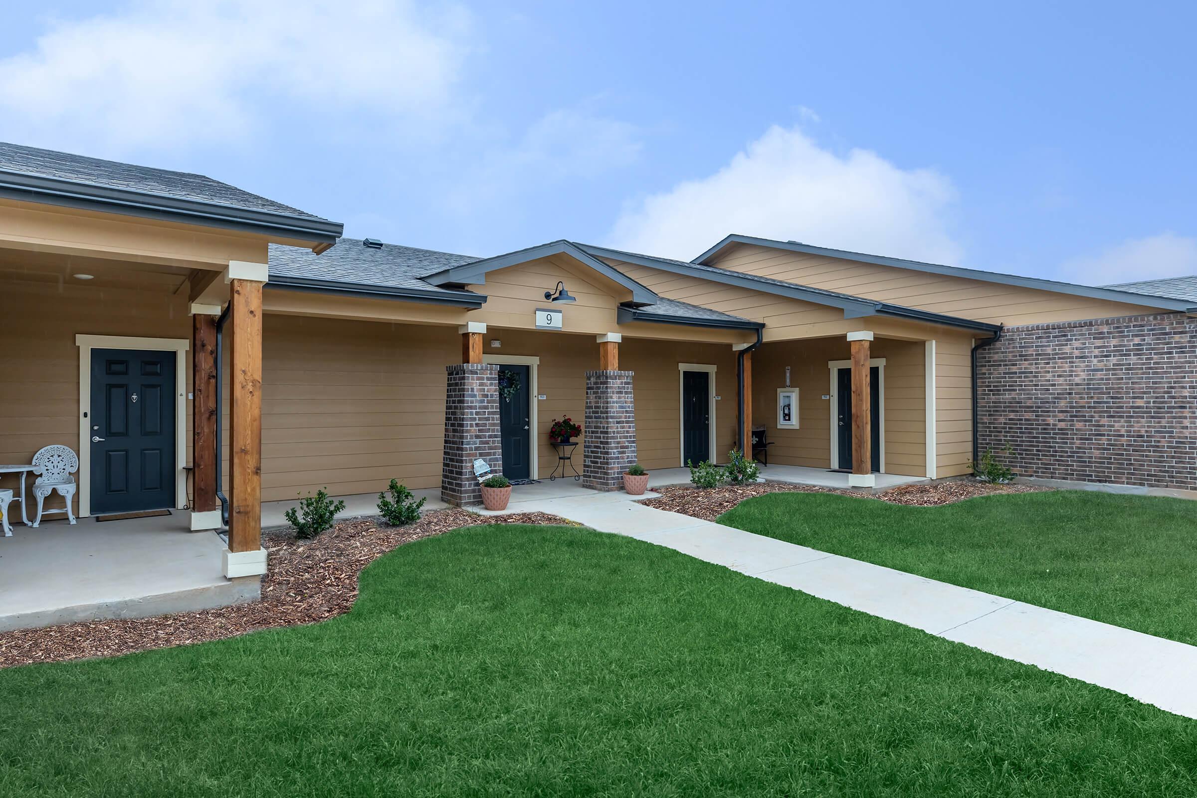 a large lawn in front of a house